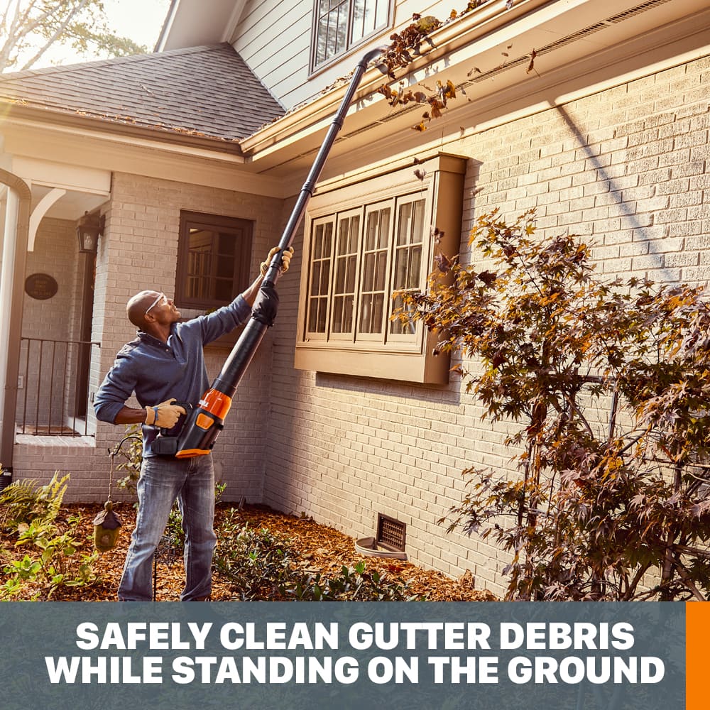 Safely clean gutter debris while standing on the ground.