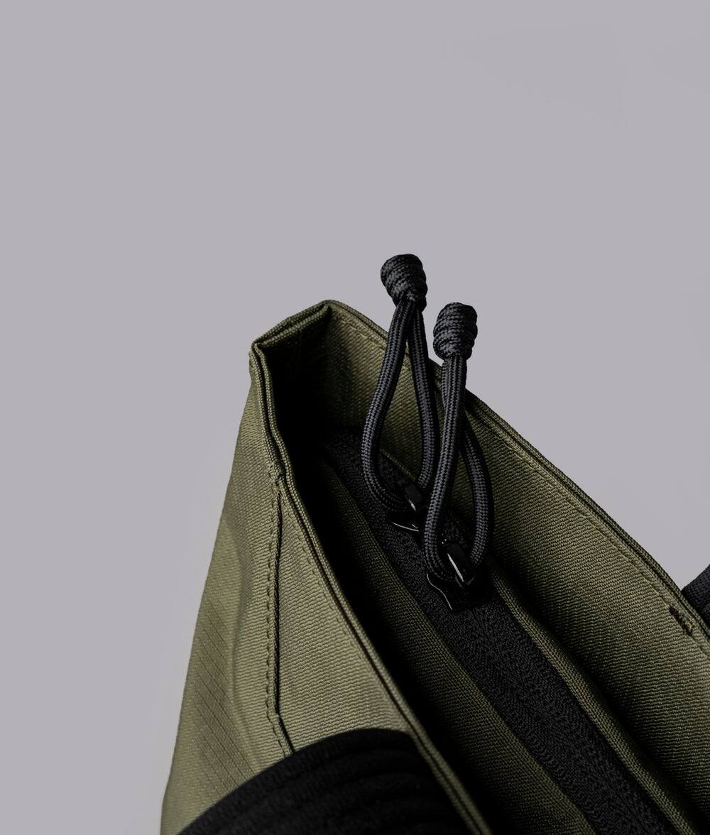 Alt View 7. ALPAKA - Flight Tote (M) Laptop Tote Bag for Work, Tote Bag Fits 14" MacBook Pro, Water Bottle Pocket, Luggage Pass-Through - Green Axoflux 400D.