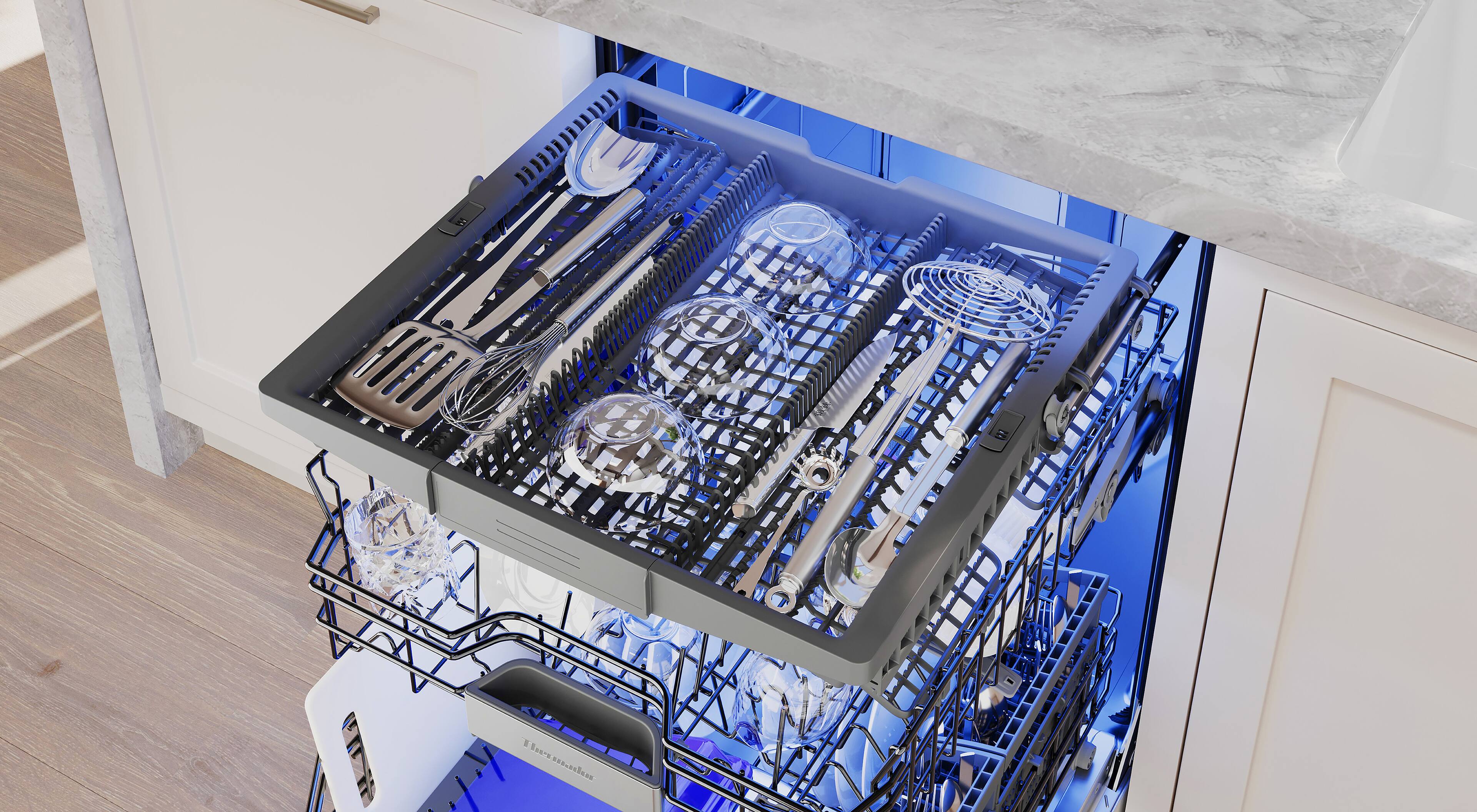 The image shows a dishwasher with a rack of dishes inside. The dishes include a variety of utensils such as forks, knives, and spoons. There are also several cups and bowls in the dishwasher. The dishwasher is filled with dishes, indicating that it is ready to be used or has recently been used.