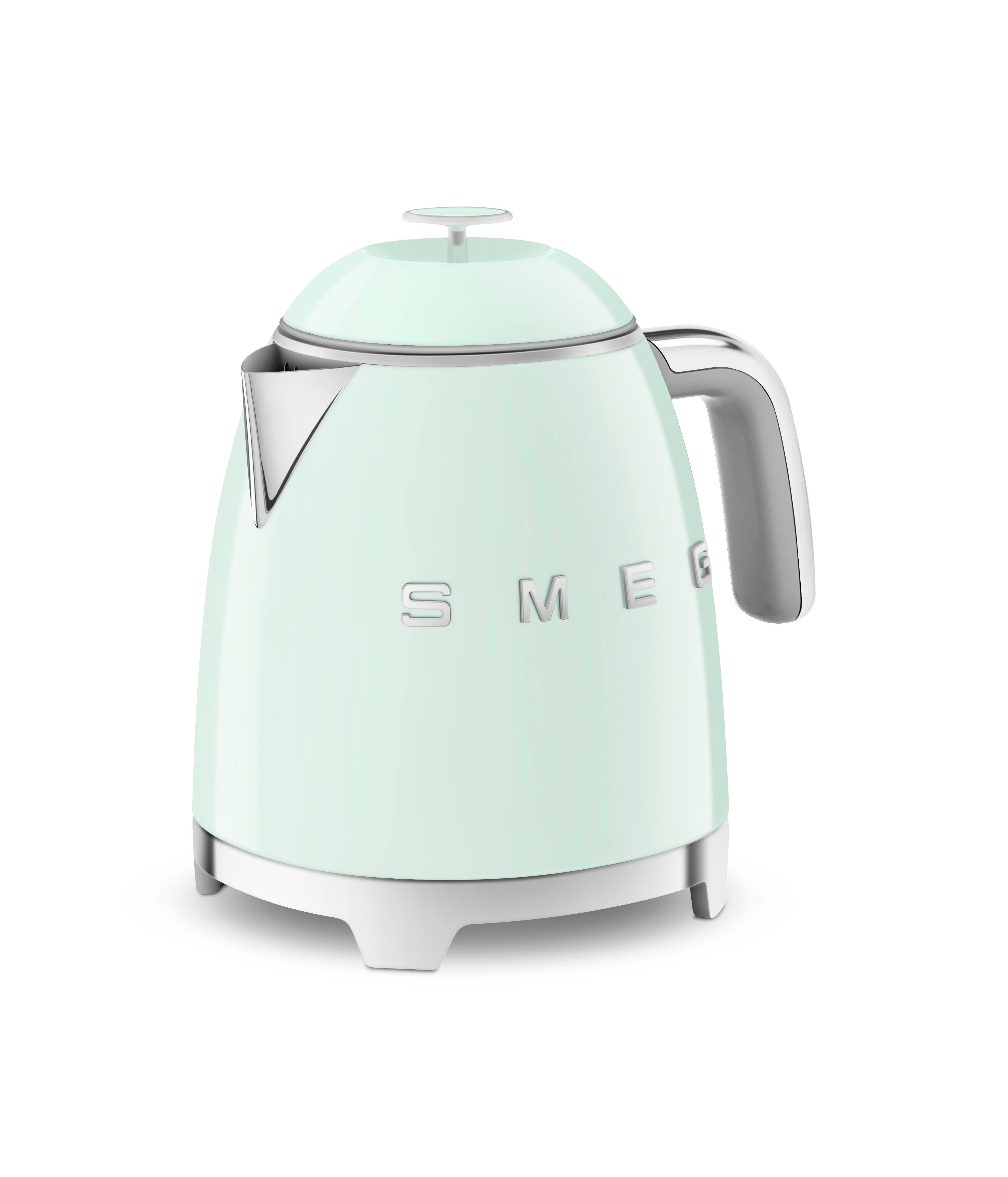 Left. SMEG - SMEG KLF05 3.5-cup Electric Mini Kettle - Pastel Green.