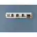 The text on the image reads "PLADLATOR k EAMAG." However, it is unclear what this text is referring to. It could be a description of the object, a brand name, or a combination of both. Without more context, it is difficult to provide a more accurate interpretation of the text.