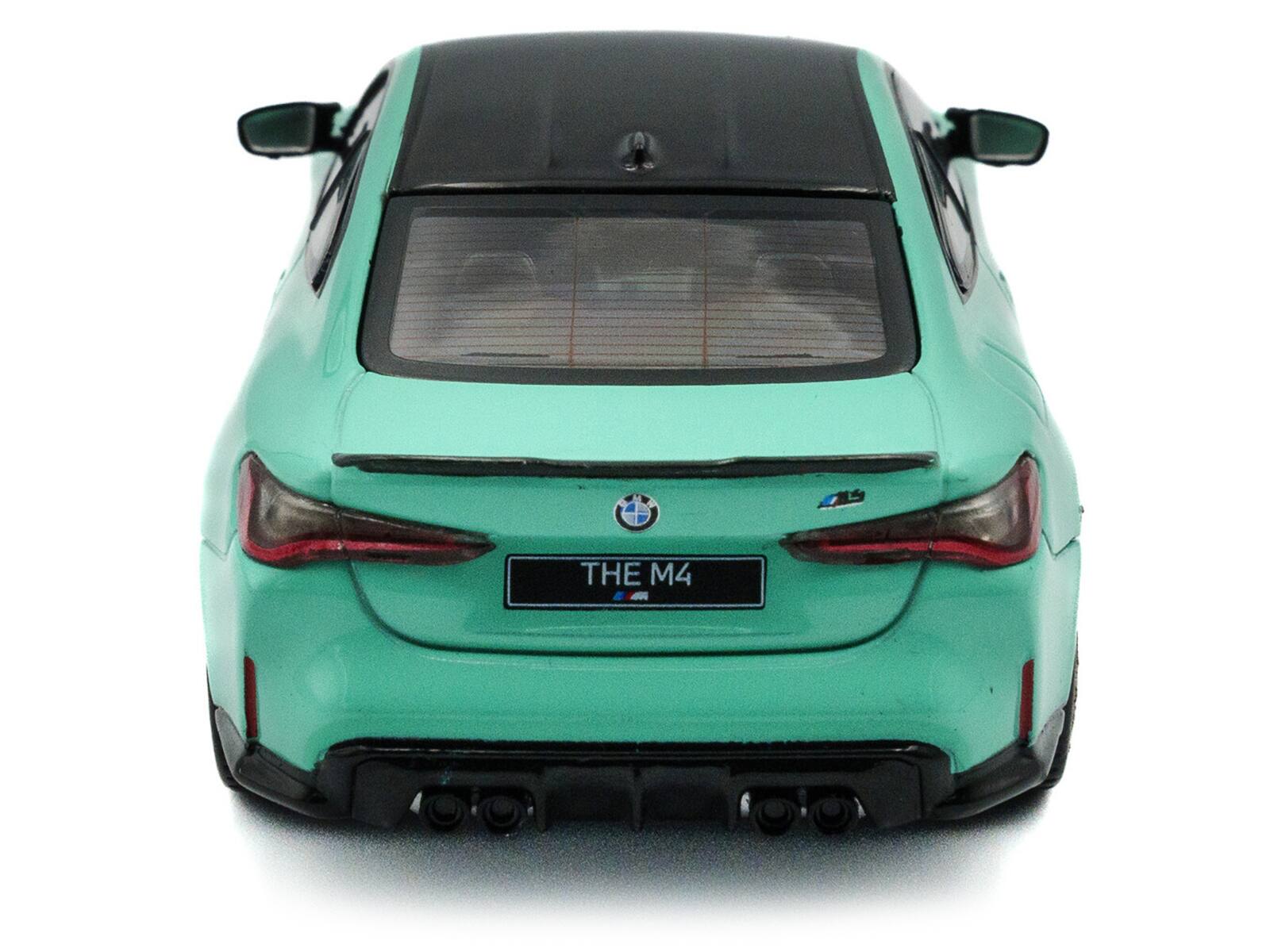 Alt View 1. Solido - 2023 BMW M4 Competition (G82) Mint Green with Black Top 1/43 Diecast Model Car by Solido - Mint Green with Black.