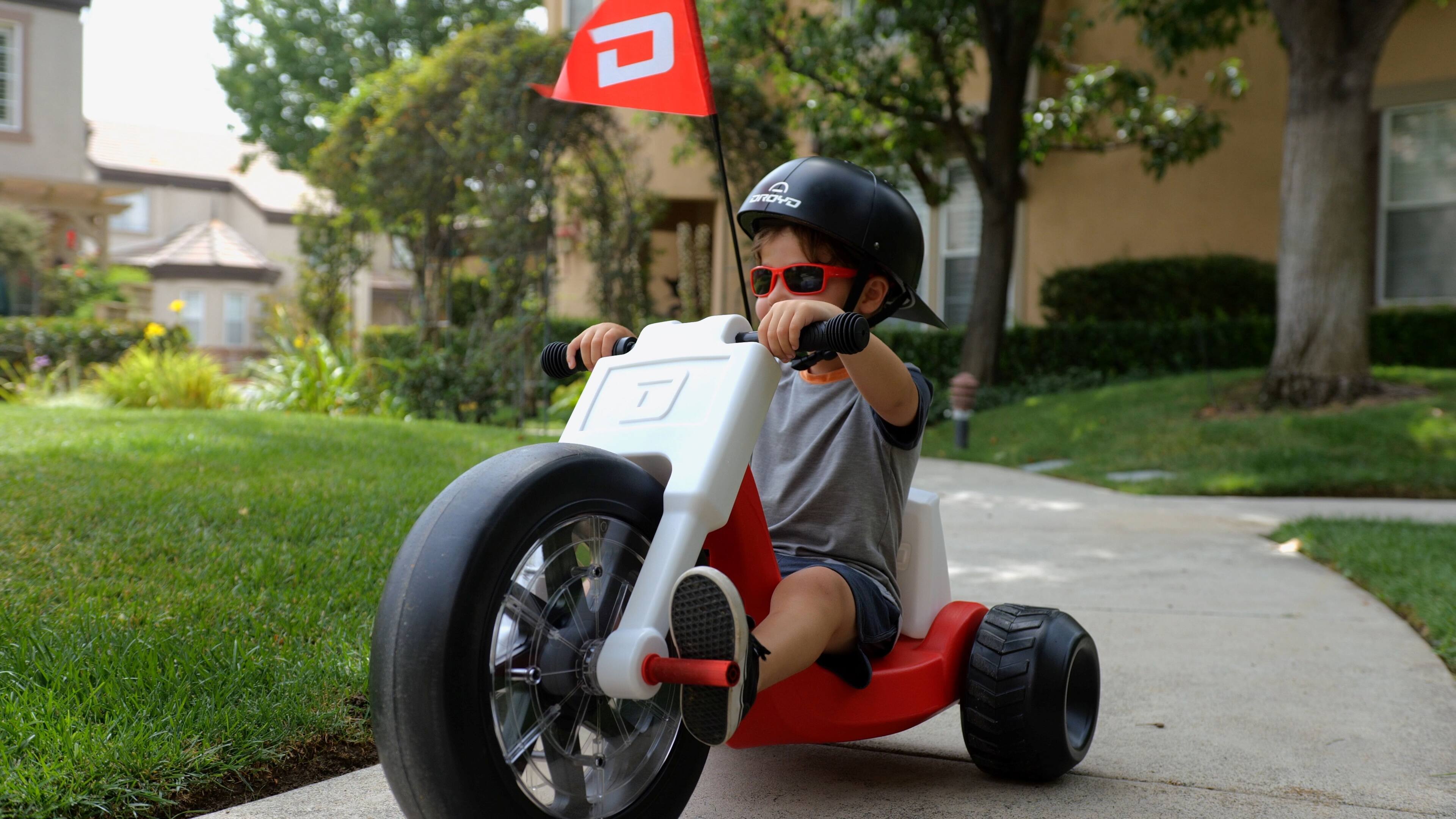 Alt View 5. Droyd - Romper Electric Tricycle for Kids 3+ w/ 3 mi Range & 6 mph Speed – Adjustable Seat, Parental Control & LEDs - Red.