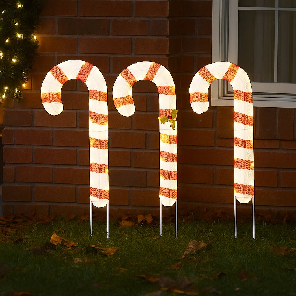 Front. BreeBe - Outdoor Lighted Candy Cane Decorations – Set of 3 with Stakes - Red + White.