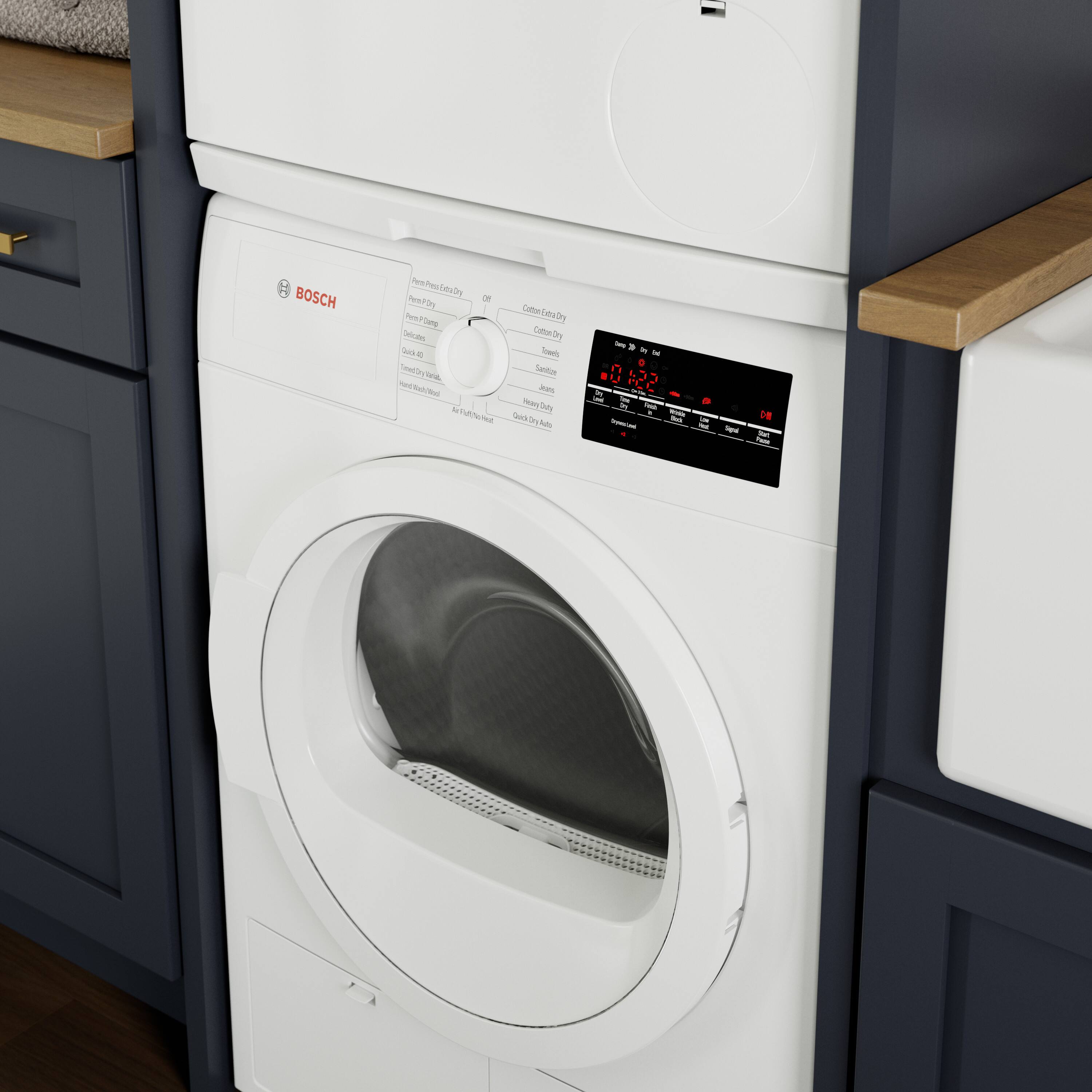 The front load washer is white and has a digital display on it.