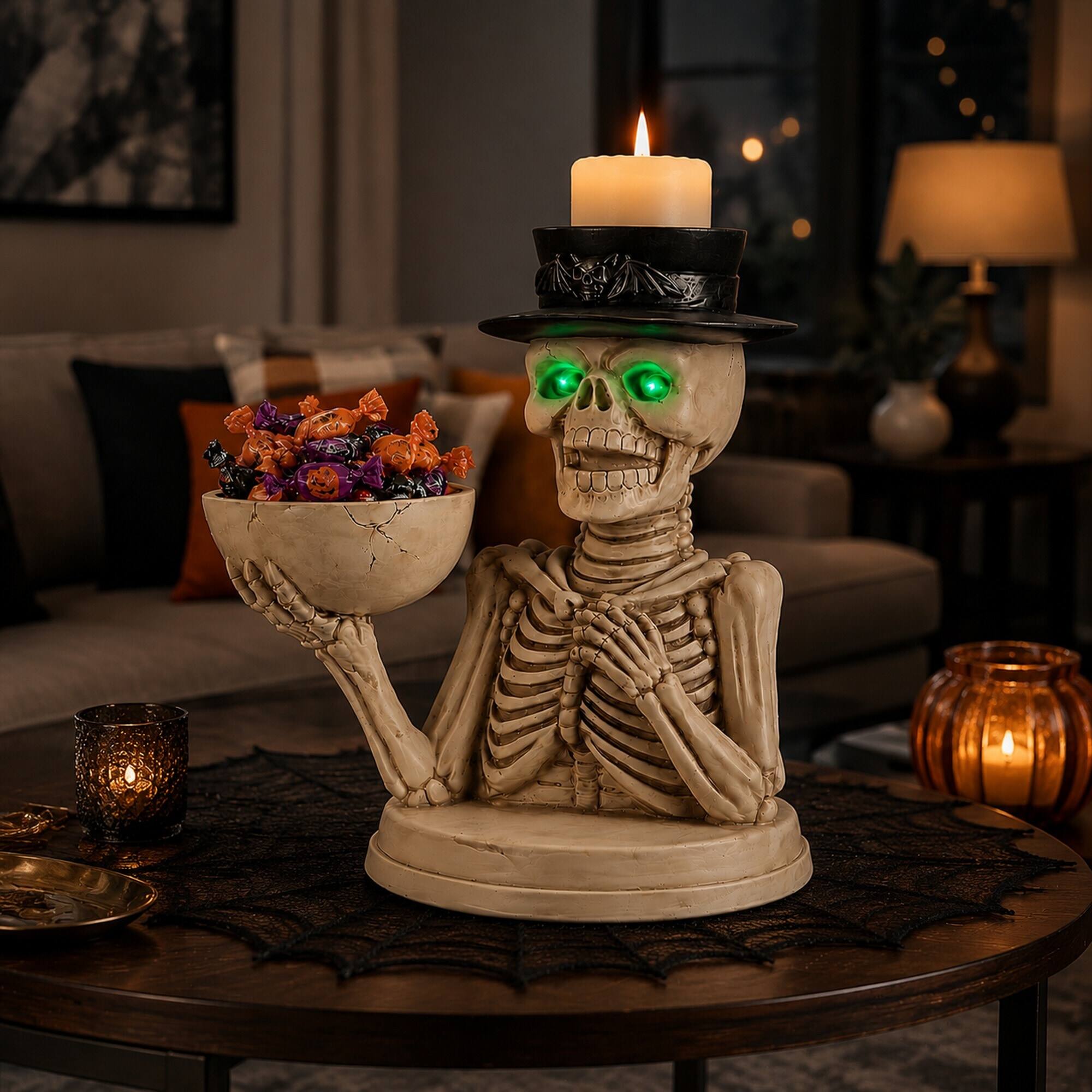 Left. RYHNUYNE - Spooky Halloween Skeleton Figurine with LED Glowing Eyes, Candy Bowl and Candle Holder for Indoor Home Decor - White.