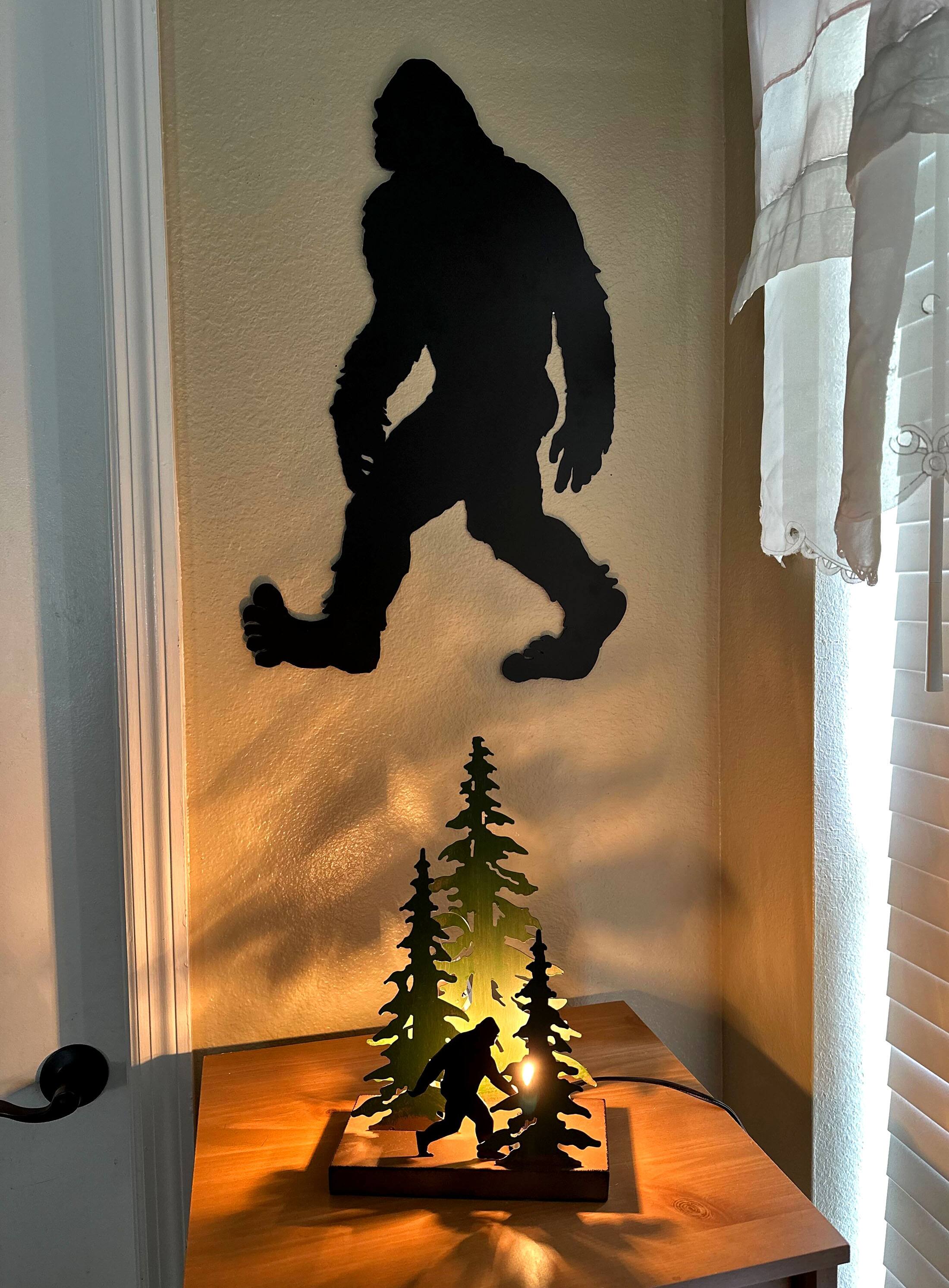 Alt View 3. Zeckos - Black Metal Laser Cut Bigfoot Walking Wall Sculpture Home Decor Sasquatch Art - Black.