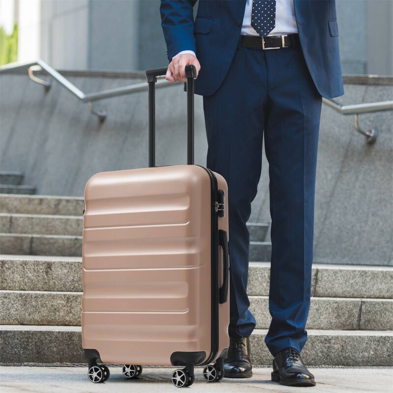 Angle. HTUTWOO - Hardshell ABS Luggage Set -Lightweight & Durable Suitcases with Dual Spinner Wheels,Carry-On & Check-In Sizes for Travel - Champagne.