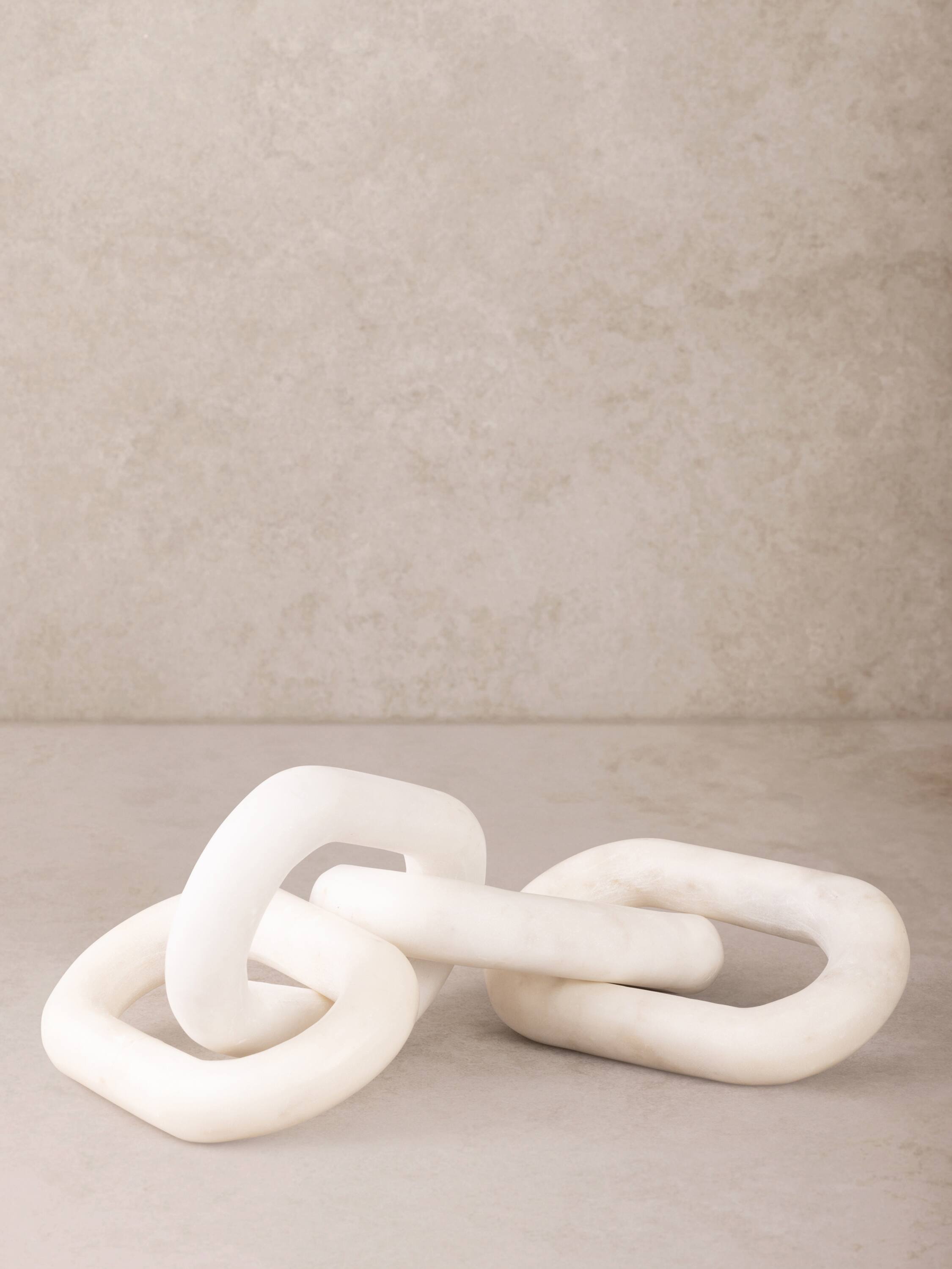 Angle. GAURI KOHLI - Eternity Chain Links - Shades of white.