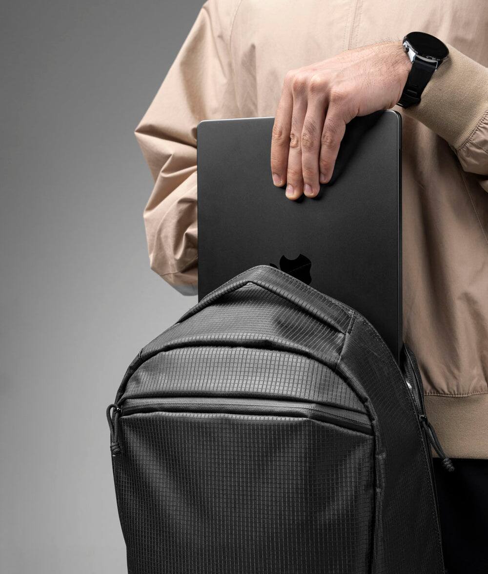 Alt View 1. ALPAKA - Lightweight 22L Laptop Backpack for 16-inch Laptop, Momentum Backpack for Work, Travel & Commuting, Weather-Resistant - Axodyne hybrid Black.