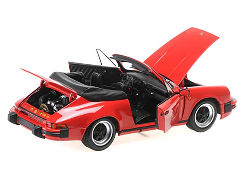 Left. Minichamps - 1983 Porsche 911 Carrera Cabriolet 3.2 Red 1/18 Diecast Model Car by Minichamps - Red.