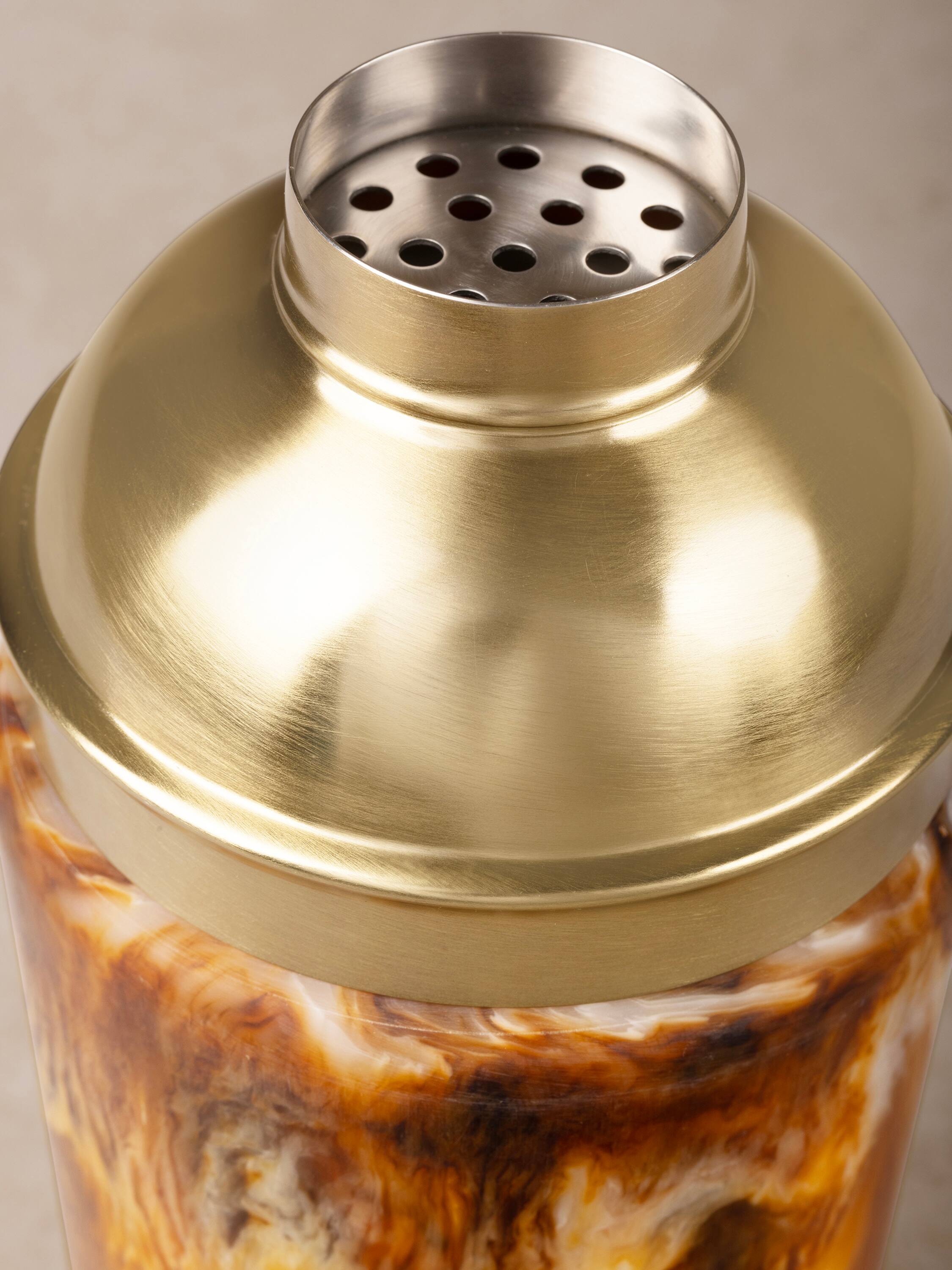 Left. GAURI KOHLI - Kampai Cocktail Shaker - Shades of brown, with matte gold.