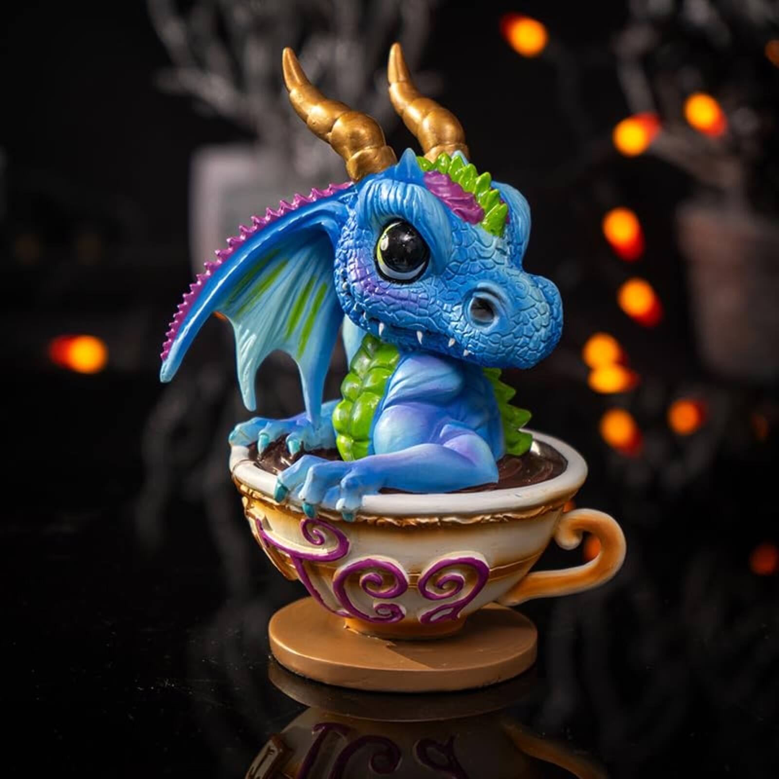 Angle. Pacific Trading - Ruth Thompson Cup of Tea Blue Dragon Figurine 6.1 inches.