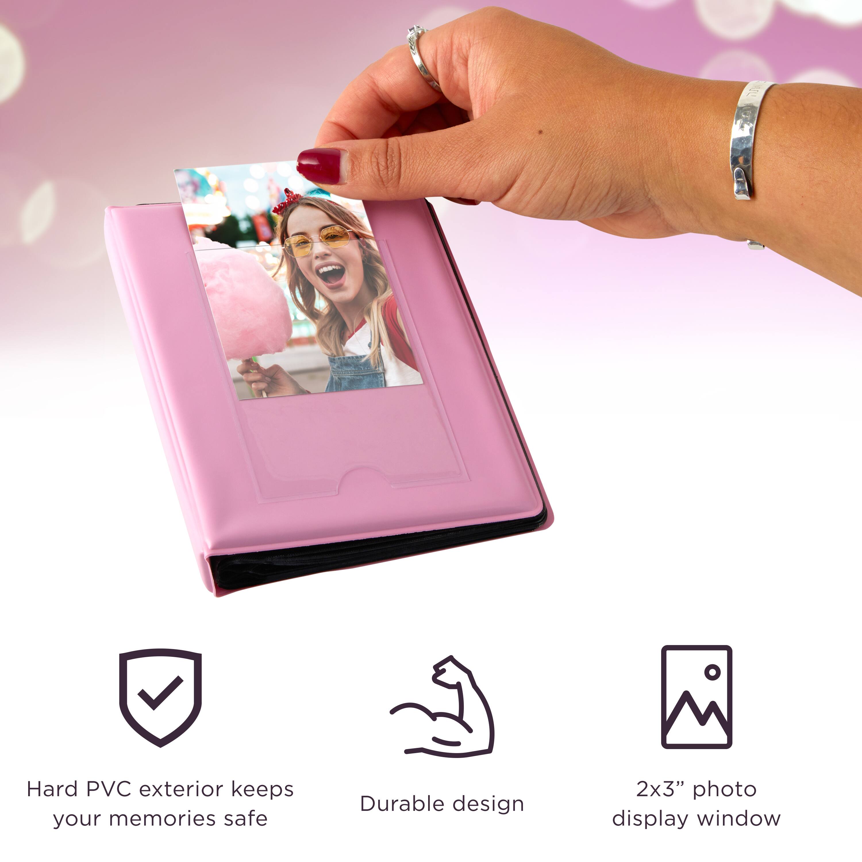 - Hard PVC exterior keeps your memories safe
- Durable design
- 2x3" photo display window