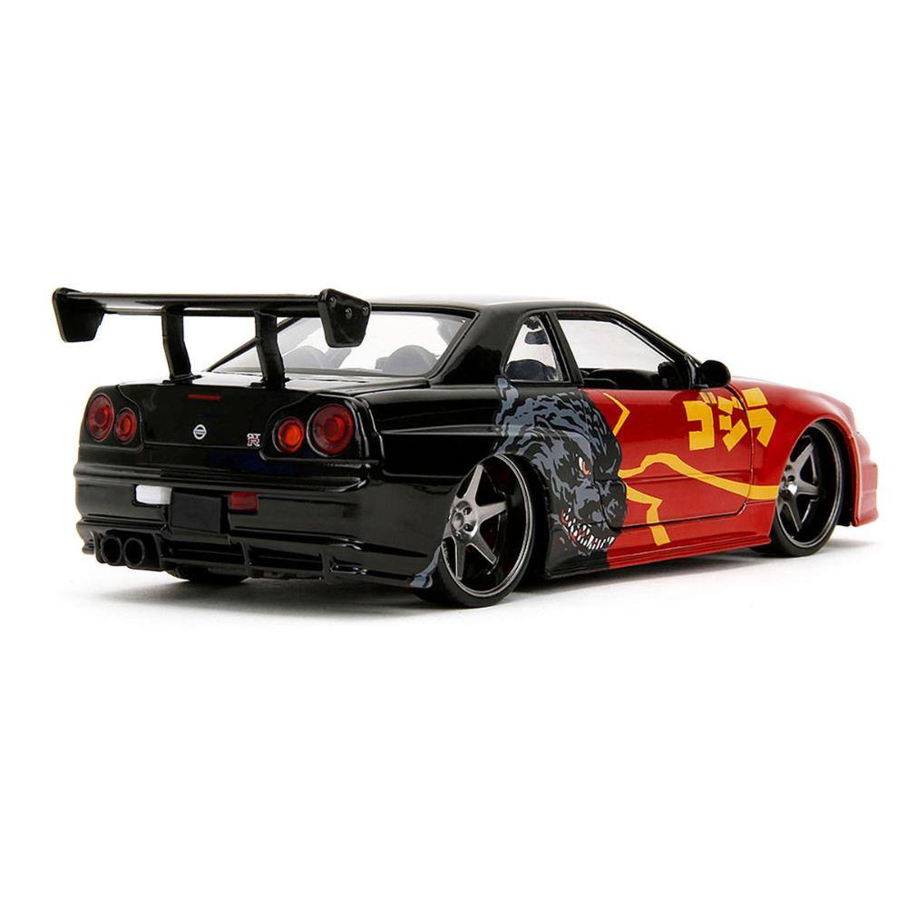 Left. Jada - 2002 Nissan Skyline GT-R R34 RHD Red Metallic/Black – Godzilla vs. Destoroyah (1995) Hollywood Rides 1/24 - Red Metallic and Black.