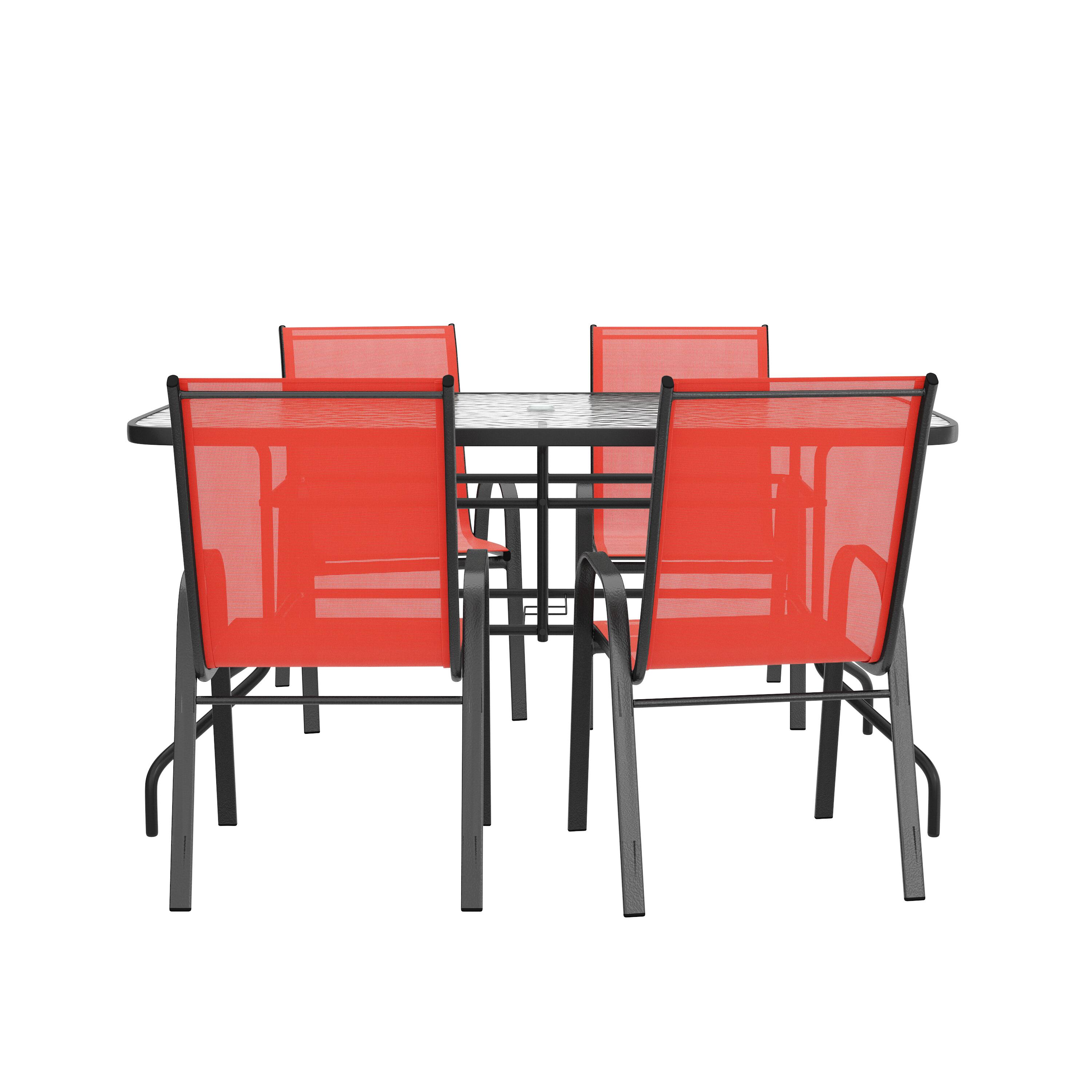 Angle. Flash Furniture - Brazos 5 Piece Outdoor Patio Dining Set - 55" Tempered Glass Patio Table with Umbrella Hole, 4 Red Flex Comfort Stack Ch - Red.