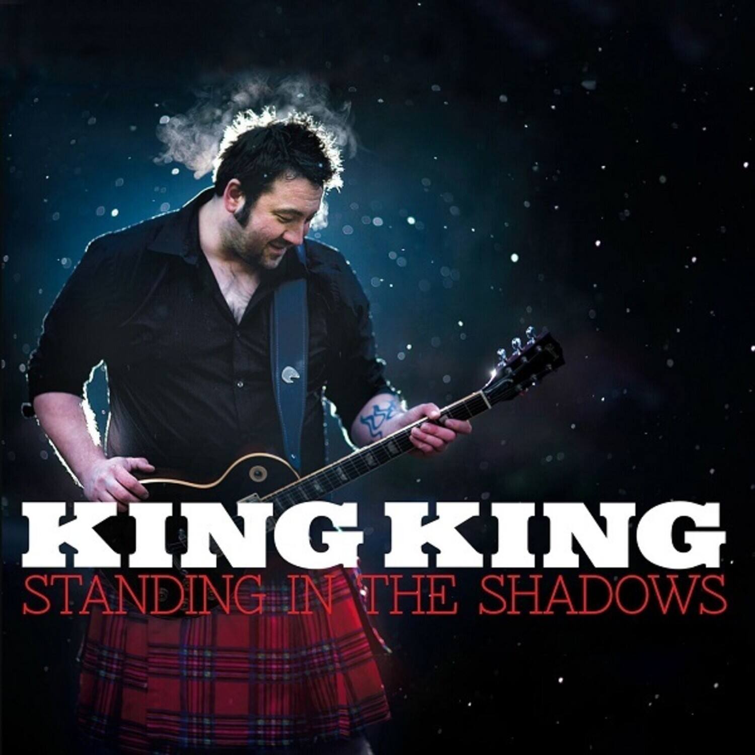 KING KING  
STANDING IN THE SHADOWS