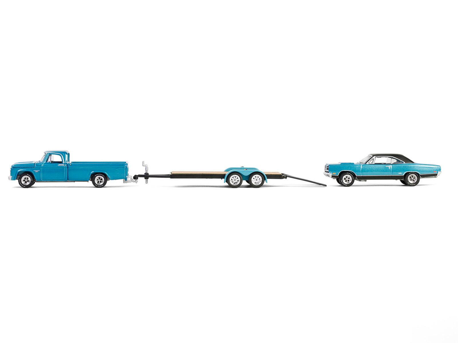 Alt View 1. Greenlight - 1969 Plymouth GTX and 1967 Dodge D-200 Pickup Turquoise Metallic Flatbed Trailer Graveyard Carz Hollywood Hitch 1/64 - Turquoise Metallic.