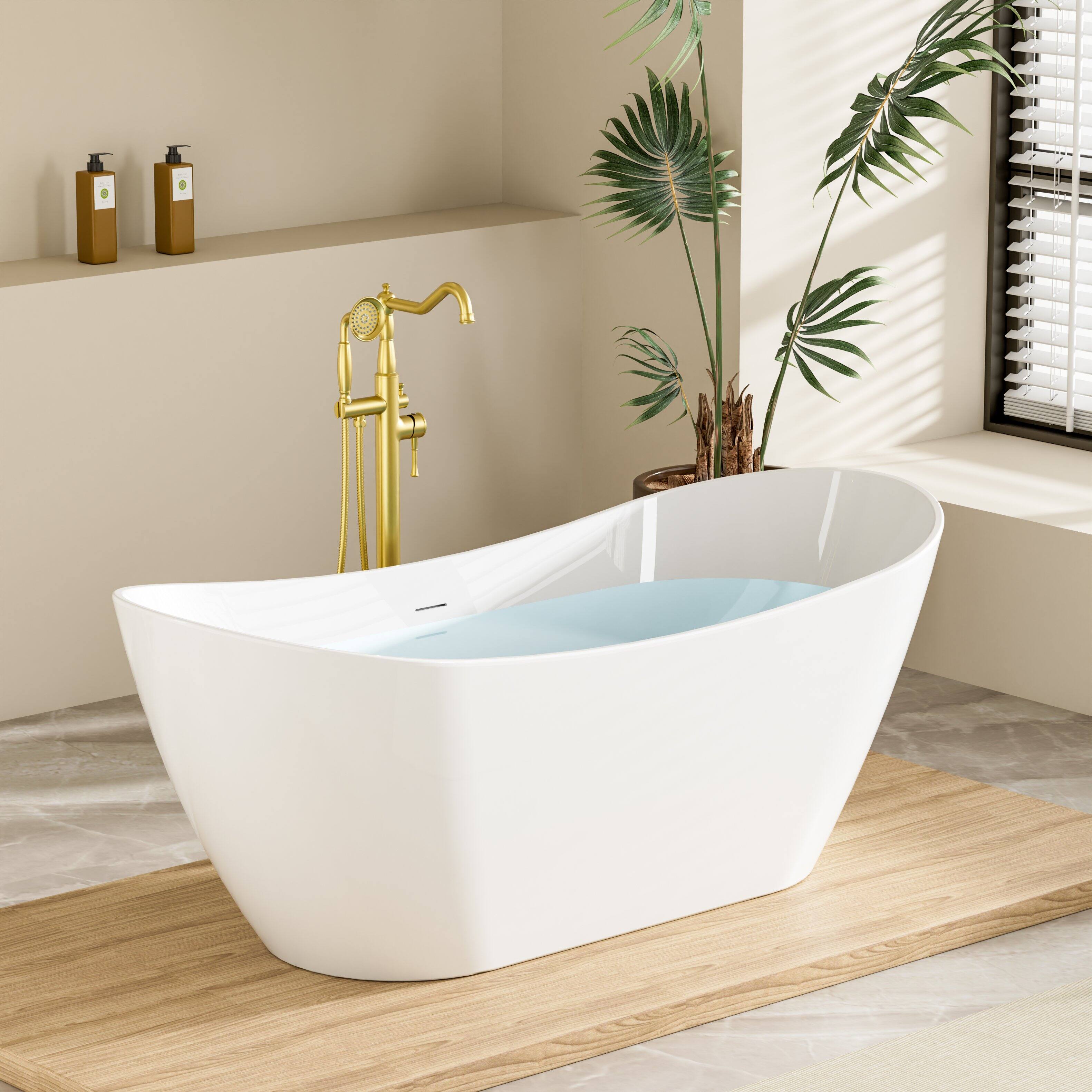 Angle. WELLFOR - Vela 67 in. x 29 in. Acrylic Oval Freestanding Soaking Bathtub with Center Drain and Overflow - White.