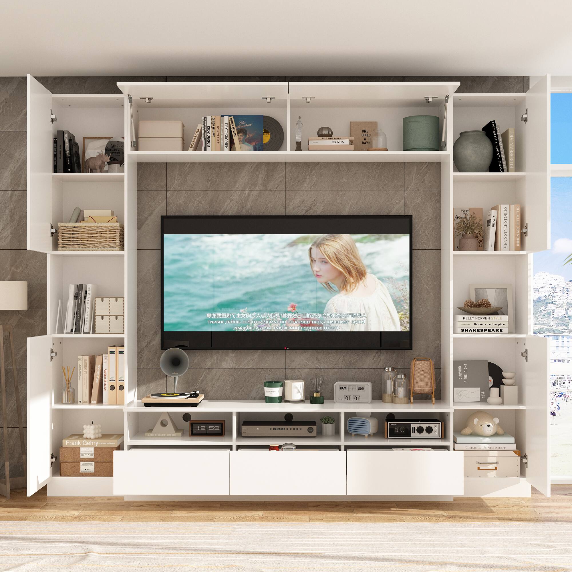 The text on the image is: 

- KELLY HOPPENSTILL
- SHAKESPEARE
- Frank Gehry