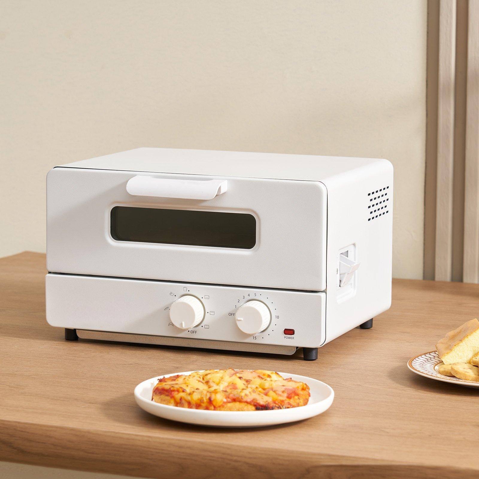 The text on the image reads:

"Q. DET . . - OFF - 4 % 5 PUMER"

This appears to be a combination of labels and settings for the appliance. Here's a corrected and grouped version:

- Q. DET
- . . - OFF -
- 4 % 5
- PUMER

The appliance has two knobs:
- The left knob has settings from 0 to 15.
- The right knob has settings from 3 to 15, with a "POWER" indicator.