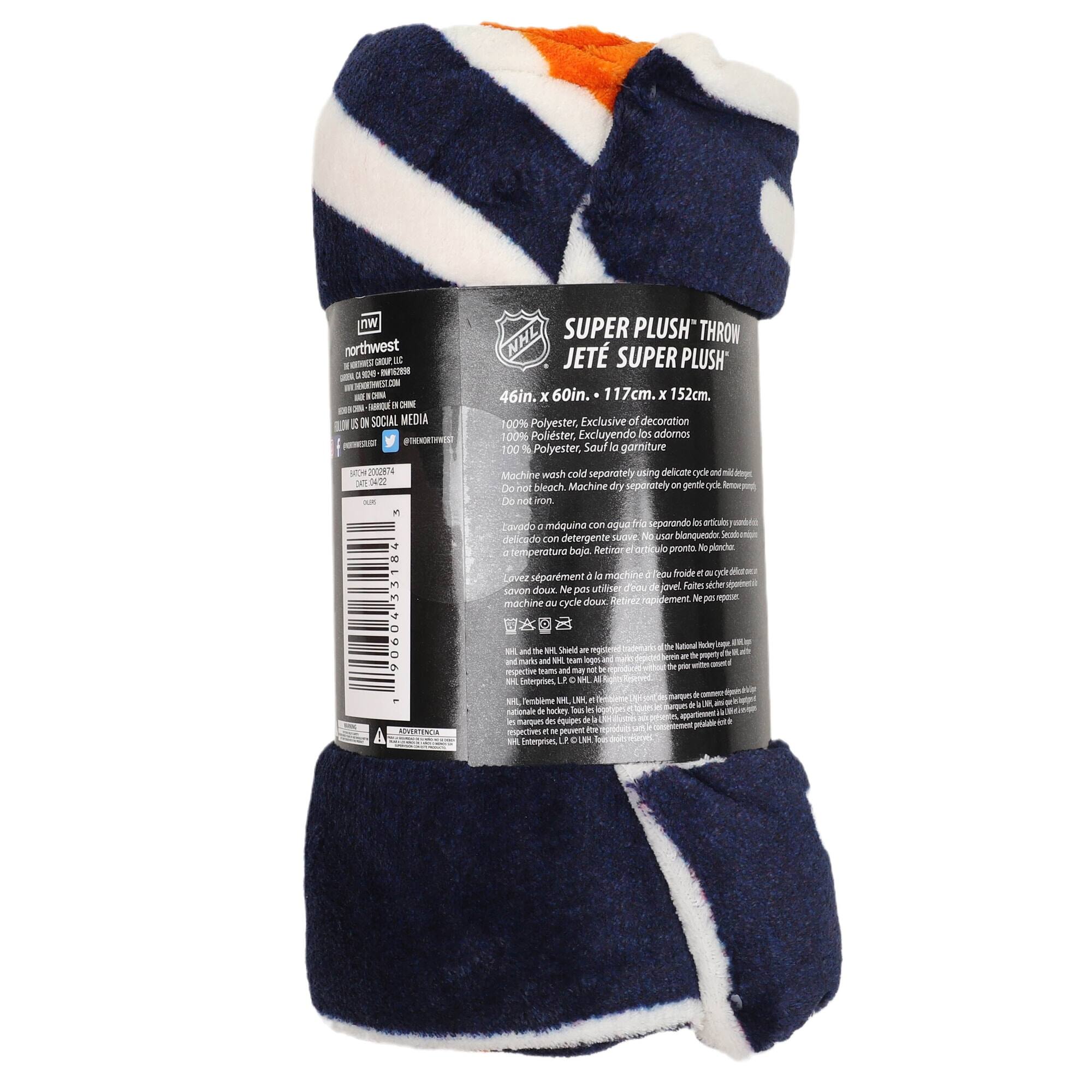 nw northwest  
46in. x 60in. - 117cm. x 152cm.  
100% Polyester, Exclusive decoration  
100% Polyester, Excluyendo los adornos  
100% Polyester, Sauf la garniture  

Machine wash cold separately using delicate cycle. Do not bleach.  
Máquina con agua fría separada usando ciclo delicado. No usar blanqueador.  
Laver à la machine froide séparément en cycle délicat. Ne pas utiliser de javel.  

SUPER PLUSH THROW  
JETÉ SUPER PLUSH  

46in. x 60in. - 117cm. x 152cm.  
100% Polyester, Exclusive of decoration  
100% Polyester, Excluyendo los adornos  
100% Polyester, Sauf la garniture  

Machine wash cold separately using delicate cycle. Do not bleach.  
Máquina con agua fría separada usando ciclo delicado. No usar blanqueador.  
Laver à la machine froide séparément en cycle délicat. Ne pas utiliser de javel.  

