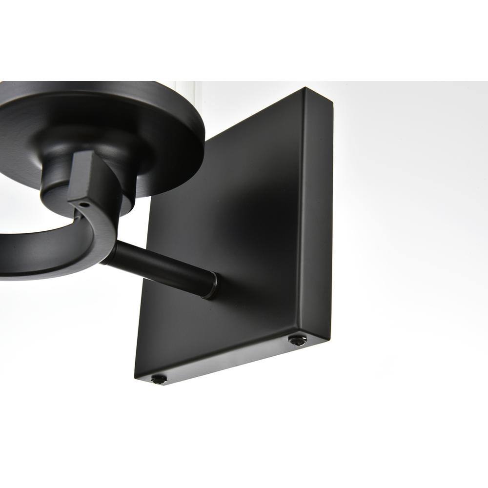 Left. Living District - Saanvi 1 light Black and Clear Bath Sconce - Black And Clear.