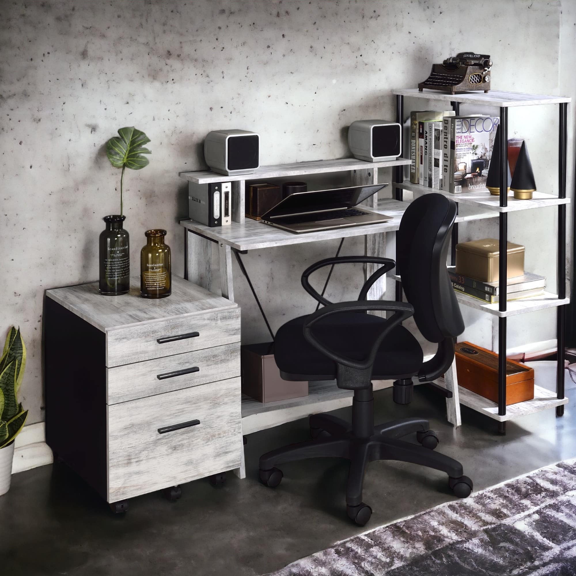 Sure, here is the corrected and grouped text from the image:

---

**Top Shelf:**
- DECO
- 33 Cai

**Middle Shelf:**
- DECO
- 33 Cai

**Bottom Shelf:**
- DECO
- 33 Cai

**Desk:**
- (No visible text)

**File Cabinet:**
- (No visible text)

**Bottles:**
- (No visible text)

**Other Items:**
- (No visible text)

---

This text appears to be from magazines or books on the shelves.