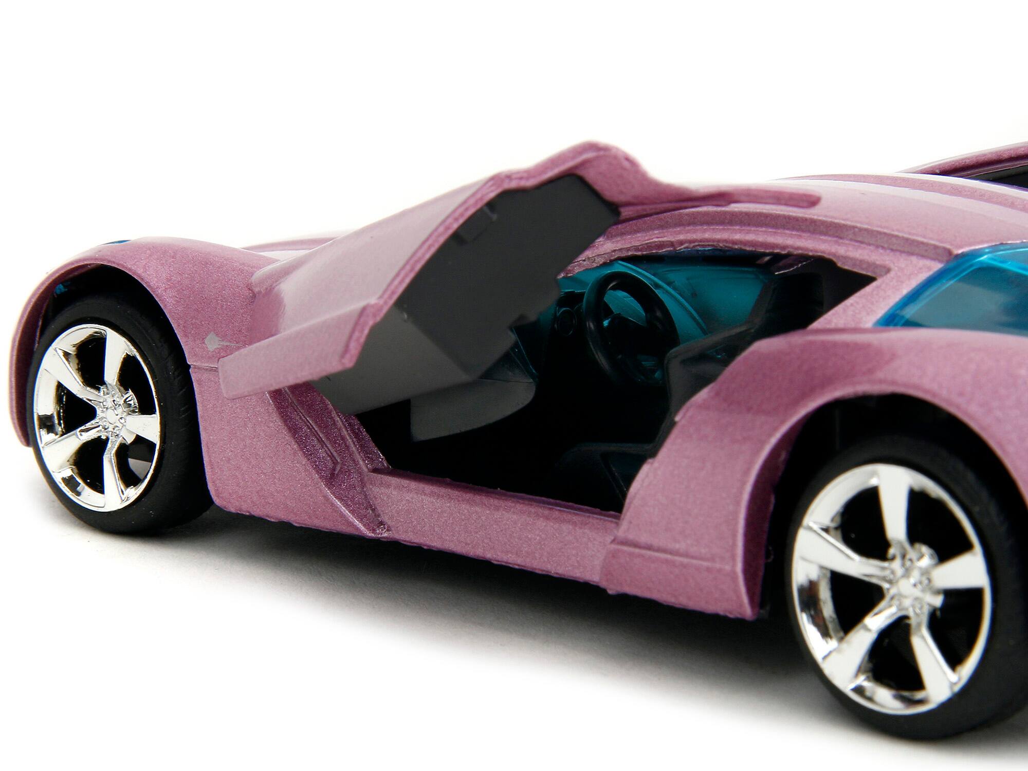 Left. Jada - 2009 Chevrolet Corvette Stingray Concept Pink Metallic with Blue Tinted Windows "Pink Slips" Series 1/32 - Pink Metallic With Blue.
