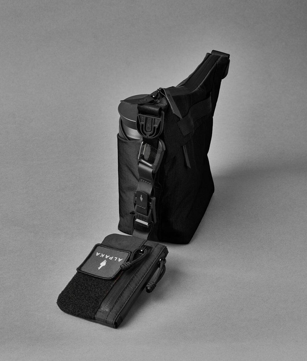 Alt View 9. ALPAKA - Flow Satchel Mini 2L Crossbody Bag, Water Resistant Shoulder Bag, Expandable Bottle Pocket, YKK Zippers - Black Axoflux 210D.