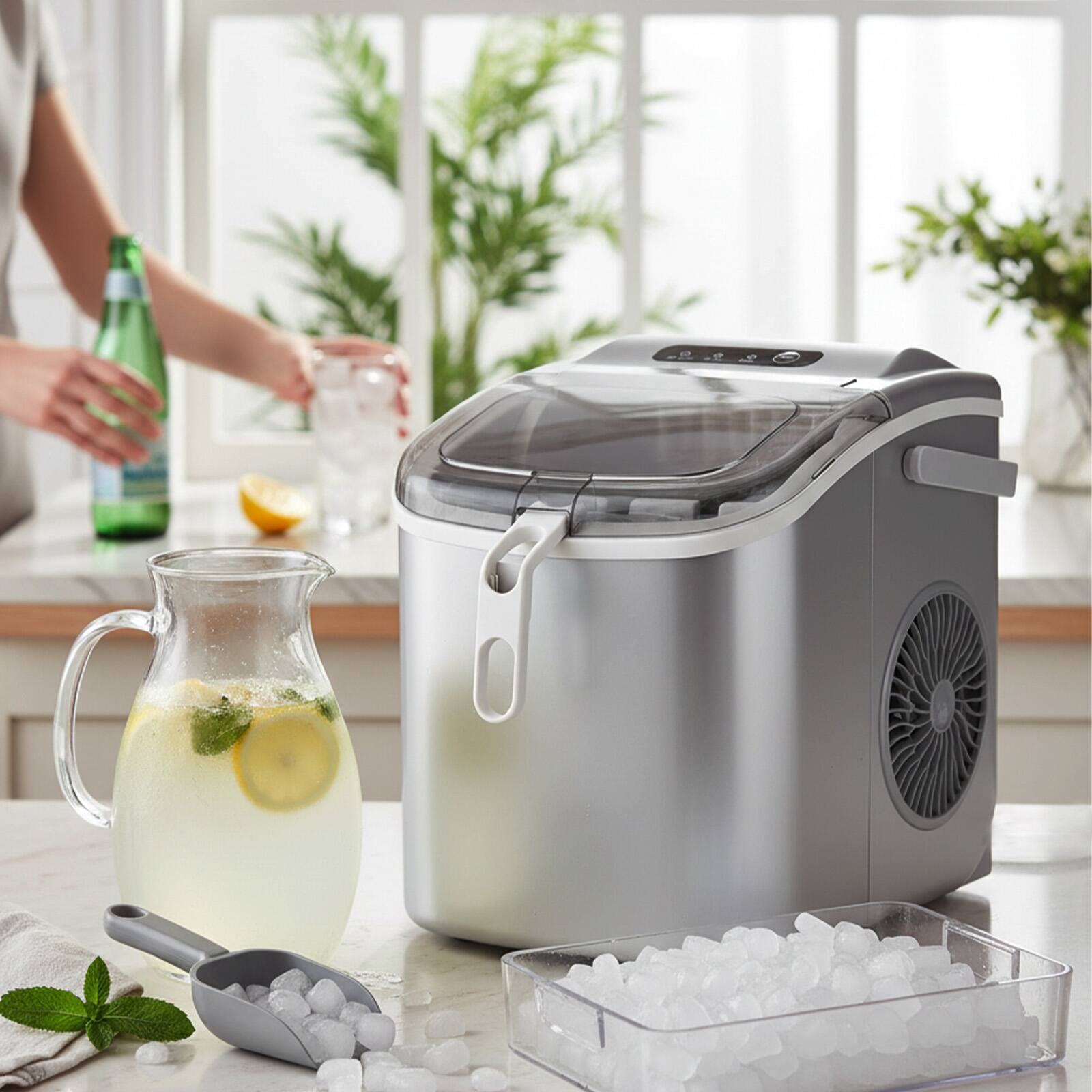 Left. LHRIVER - Portable Countertop Ice Maker with Carrying Handle and Scoop, 9 Ice Cubes in 6 Minutes, 26 lbs Daily Output - Grey.