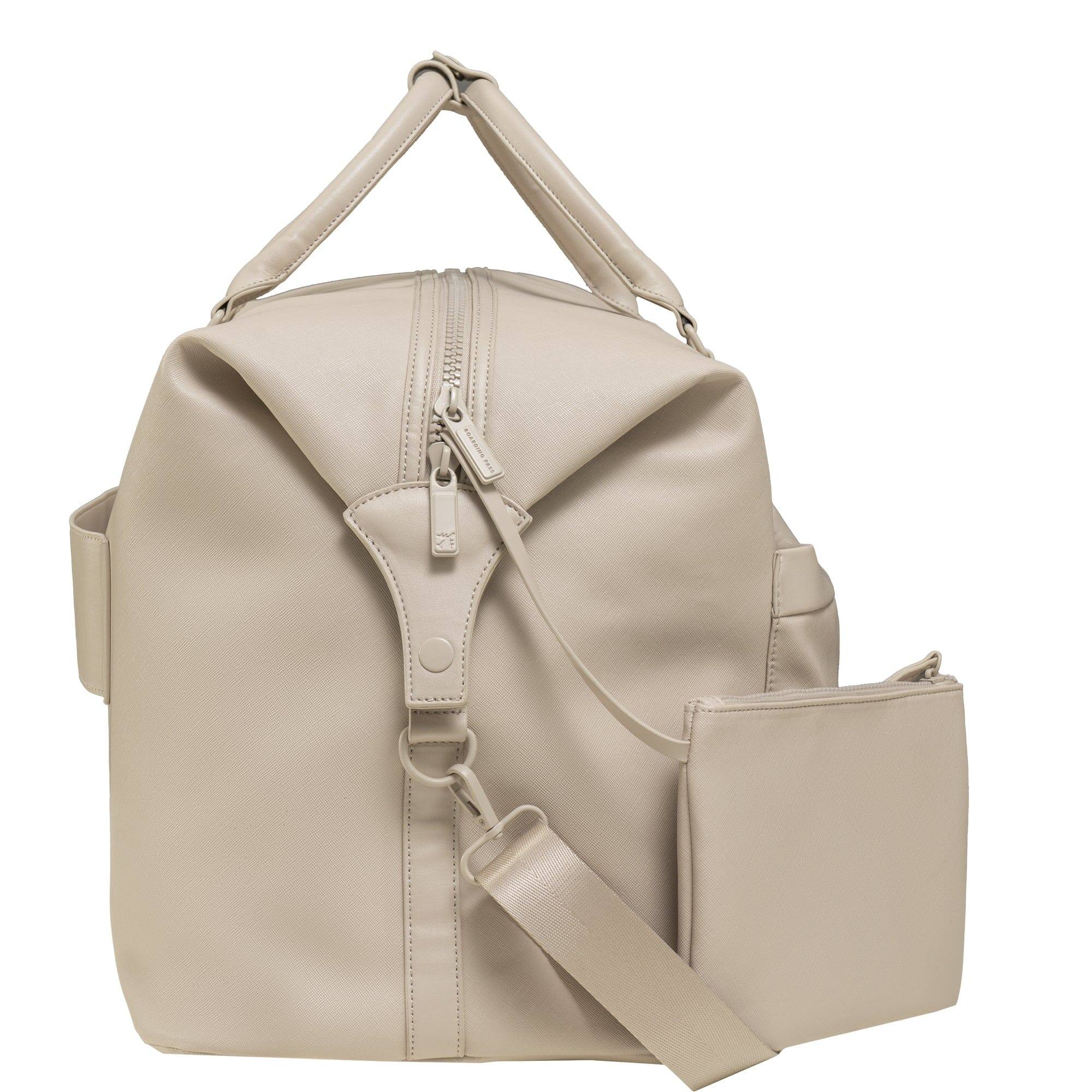 Left. Boarding Pass - Santorini Vegan Saffiano Leather Duffel. - 019-IVORY.