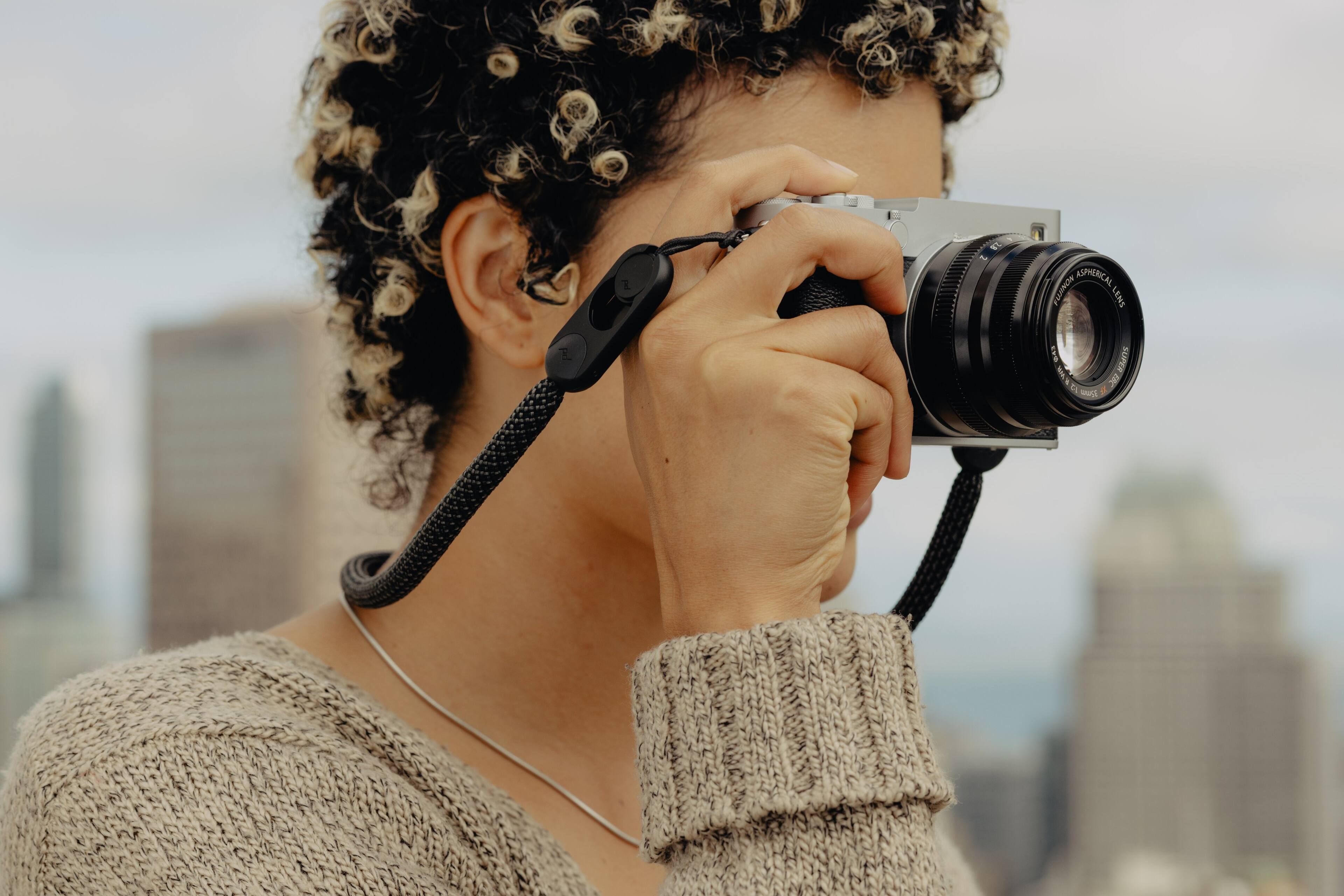 Sure, here is the corrected text:

**Z A ASPHERICAL LENS E - SUPER 15mm 1:1.7**

**TOKINA ASPHERICAL LENS**

**SUPER PROTECT CLIMATE**

**28mm**