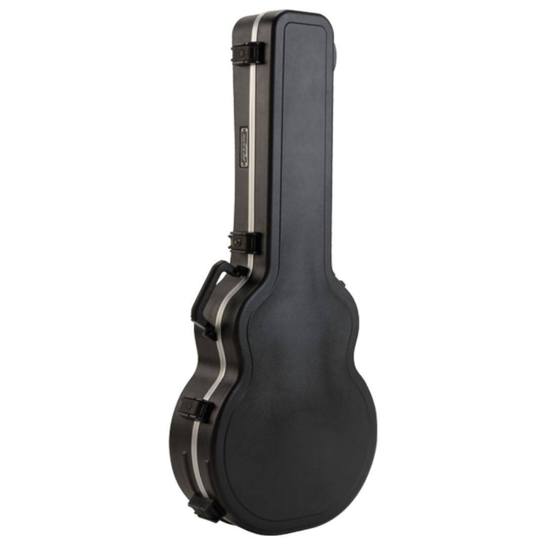 Left. SKB - SKB Cases Universal Jumbo Acoustic Deluxe Guitar Hardshell Case with TSA Latch.
