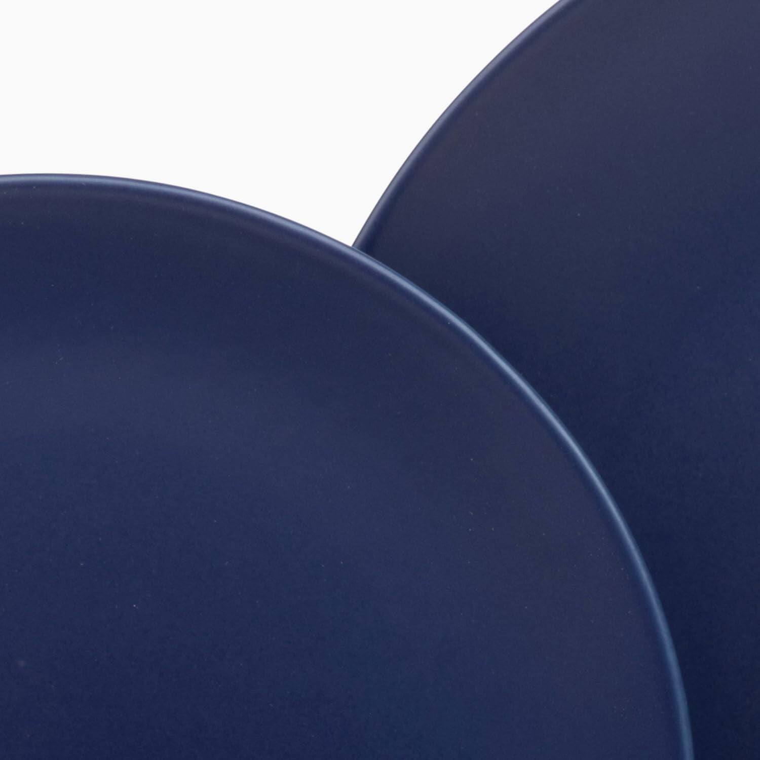 Left. Larder & Vine - 16-Piece Classic Dinnerware Set for 4, Ceramic Stoneware Made in Portugal - Indigo.
