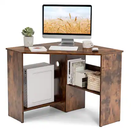 The image shows a wooden desk with a computer monitor, keyboard, and mouse. There is also a cup and a potted plant on the desk. The desk has a drawer and a shelf, and a basket is placed on the shelf. The computer monitor displays a picture of wheat.