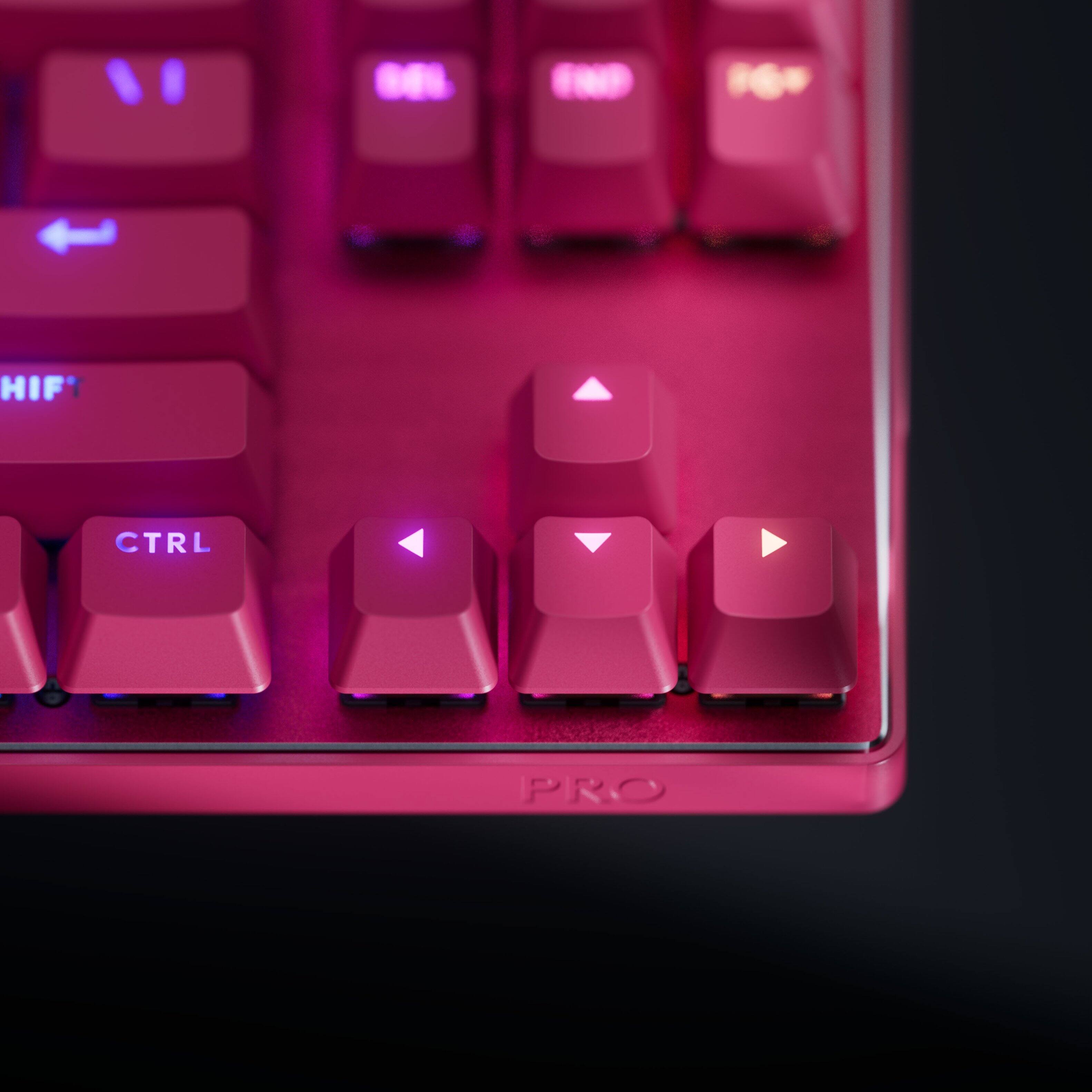 The text on the image reads "HIF' CTRL PRO." This can be grouped as "HIF' CTRL PRO" to indicate that it is a keyboard with a pink color scheme, likely designed for a gaming or professional use.