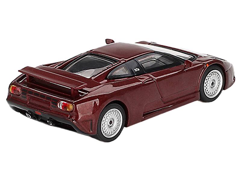 Left. Mini GT - Bugatti EB110 GT Dark Red Metallic Limited Edition 1/64 Diecast Model Car by Mini GT - Dark Red Metallic.