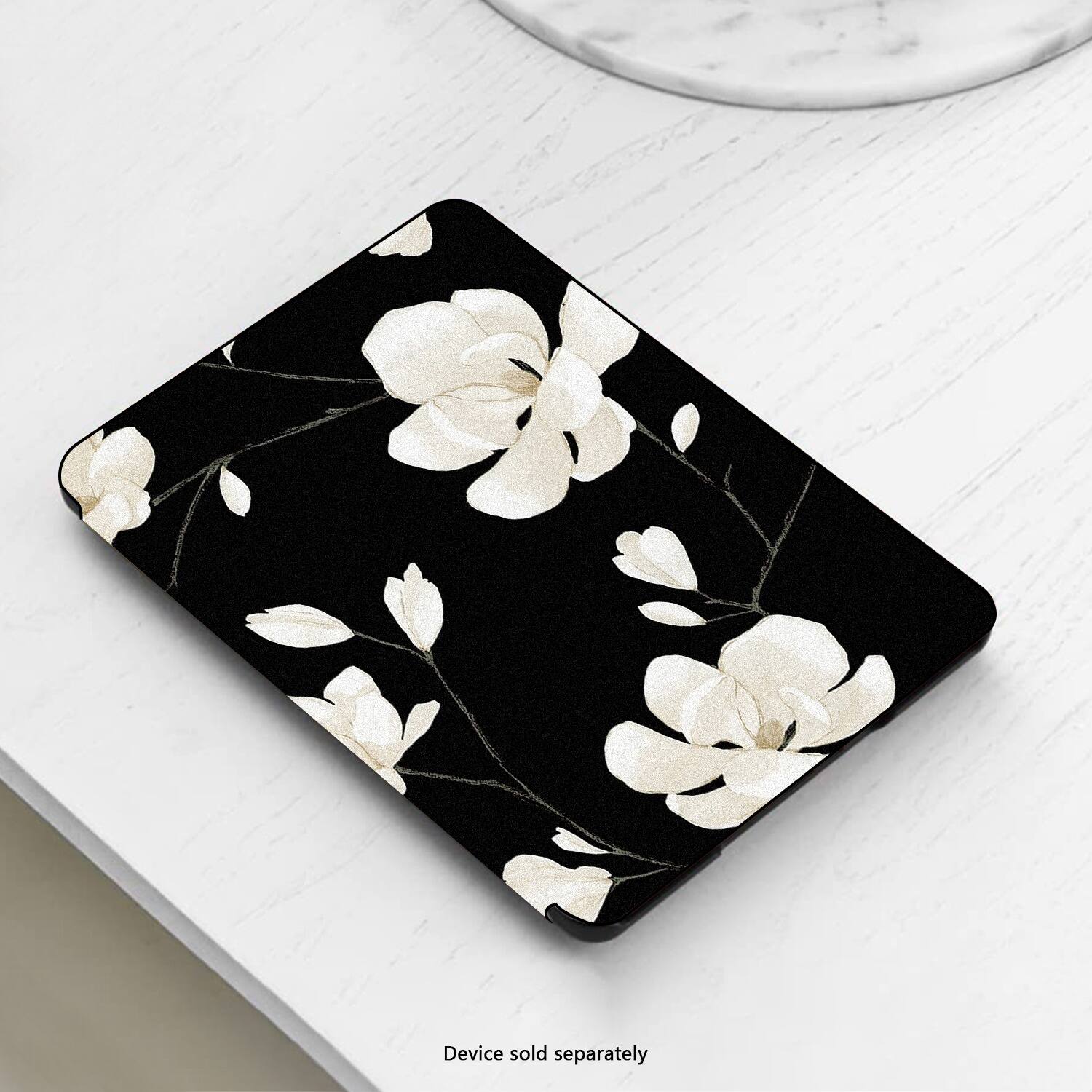 The image features a black and white floral design on a table. The text on the image reads "Device sold separately," indicating that the device is not included with the floral design and must be purchased separately.