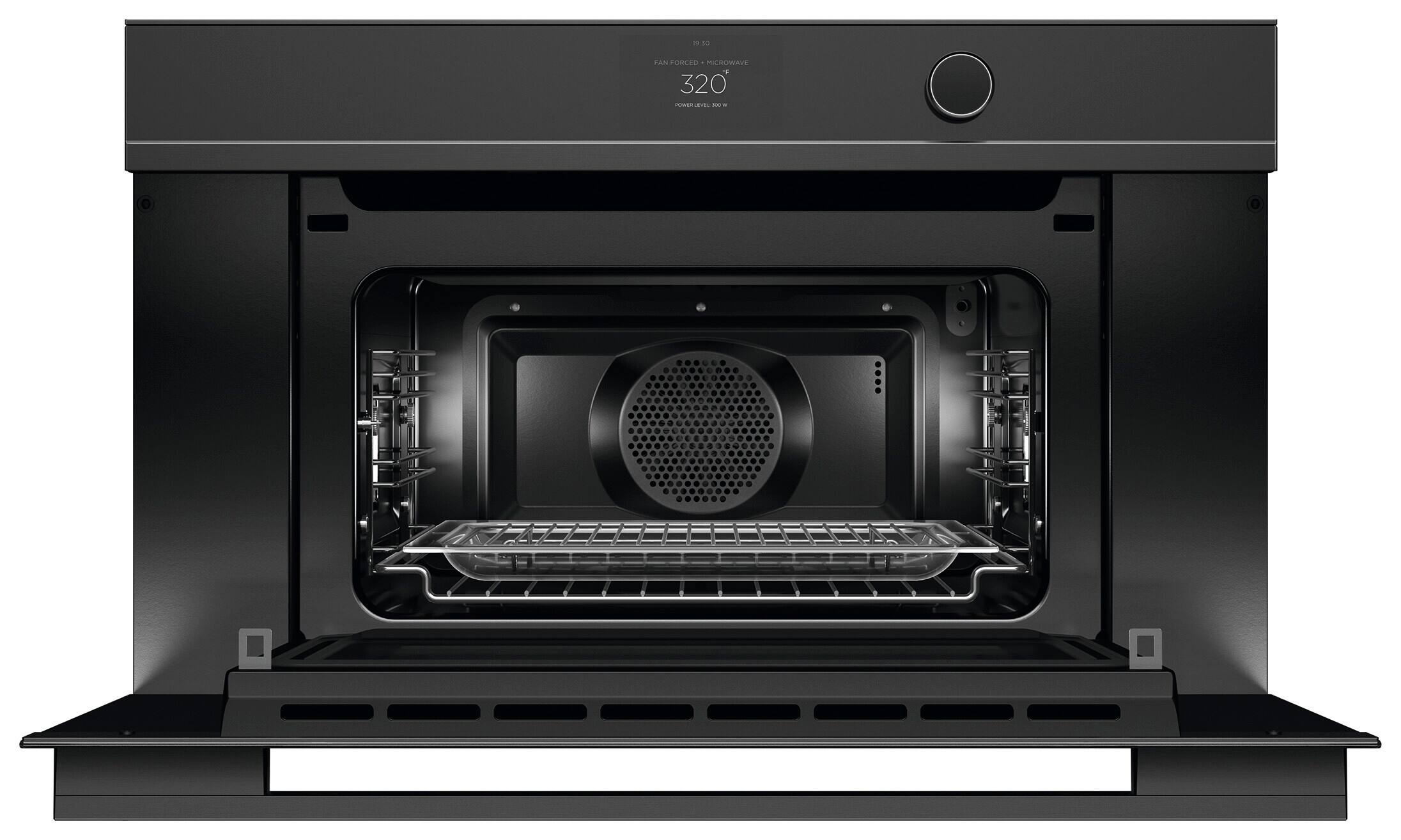 The text on the image reads: "19.30 AN FORCED . MICROWAVE 320 - LEVEL AM -". This text is likely a description or information about the microwave oven.