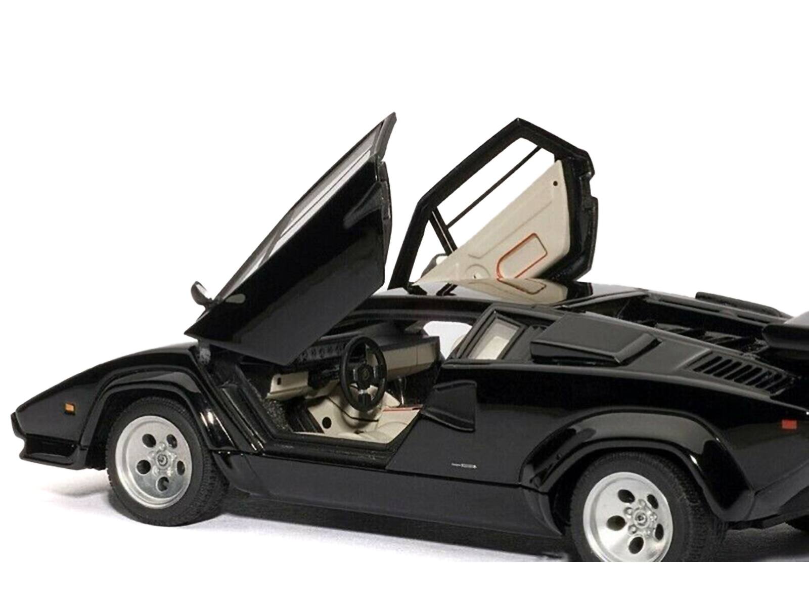 Left. Autoart - Lamborghini Countach 5000S Black 1/43 Diecast Model Car by Autoart - Black .