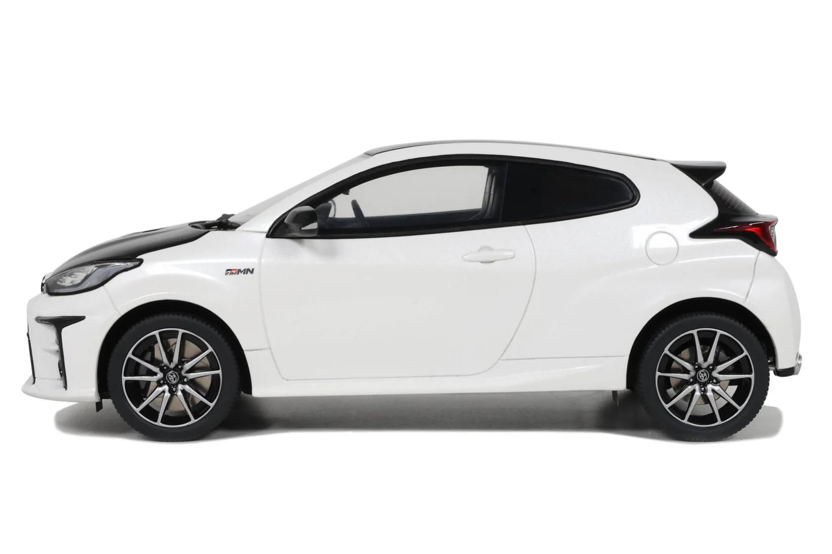 Left. Otto Mobile - 2022 Toyota GRMN Yaris RHD Platinum White Pearl Black Hood & Top Limited Edition 999 pcs Worldwide 1/18 Scale - White Pearl Black.