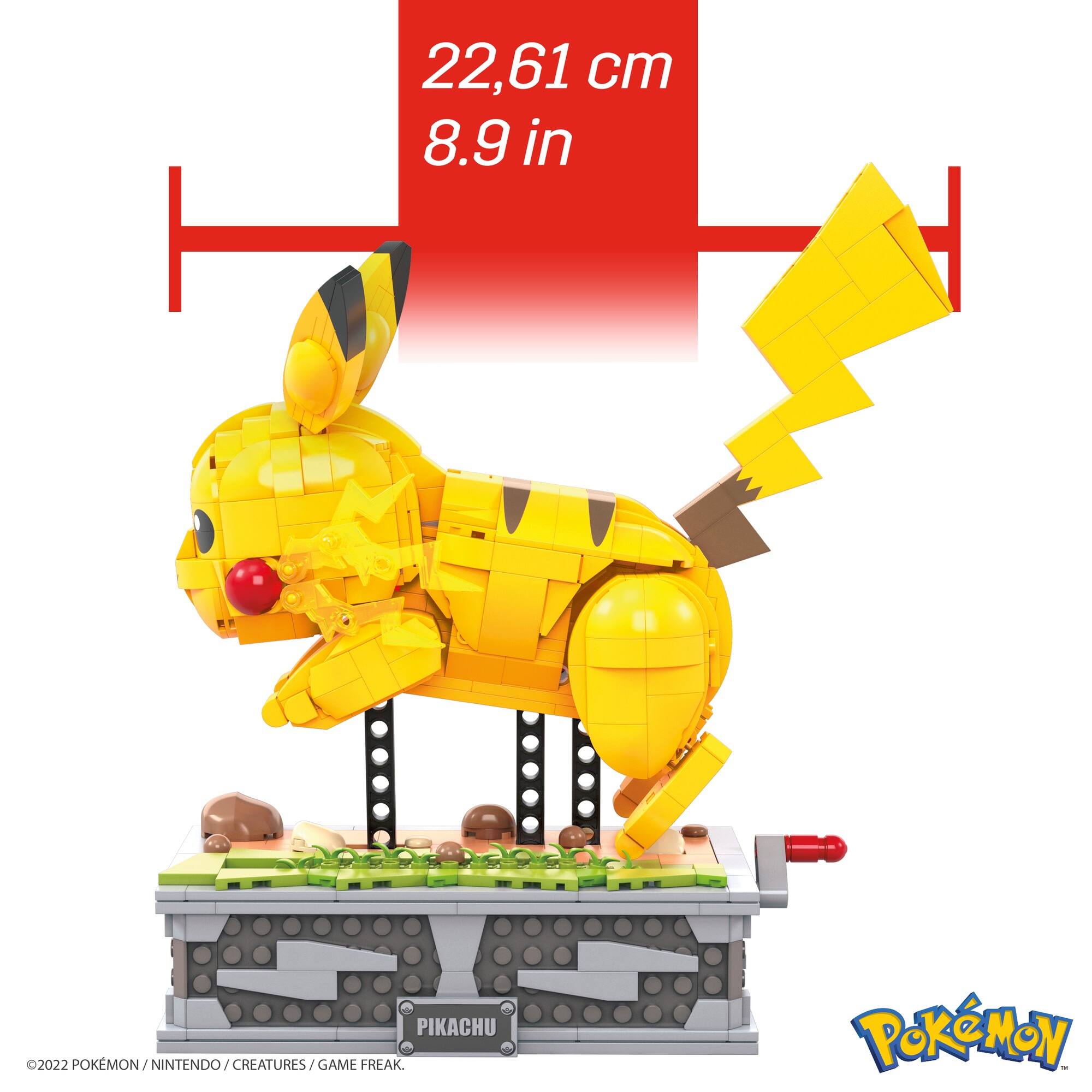 Left. Pokémon - MEGA Pokémon Motion Pikachu Building Brick Set with Mechanized Motion - Yellow.