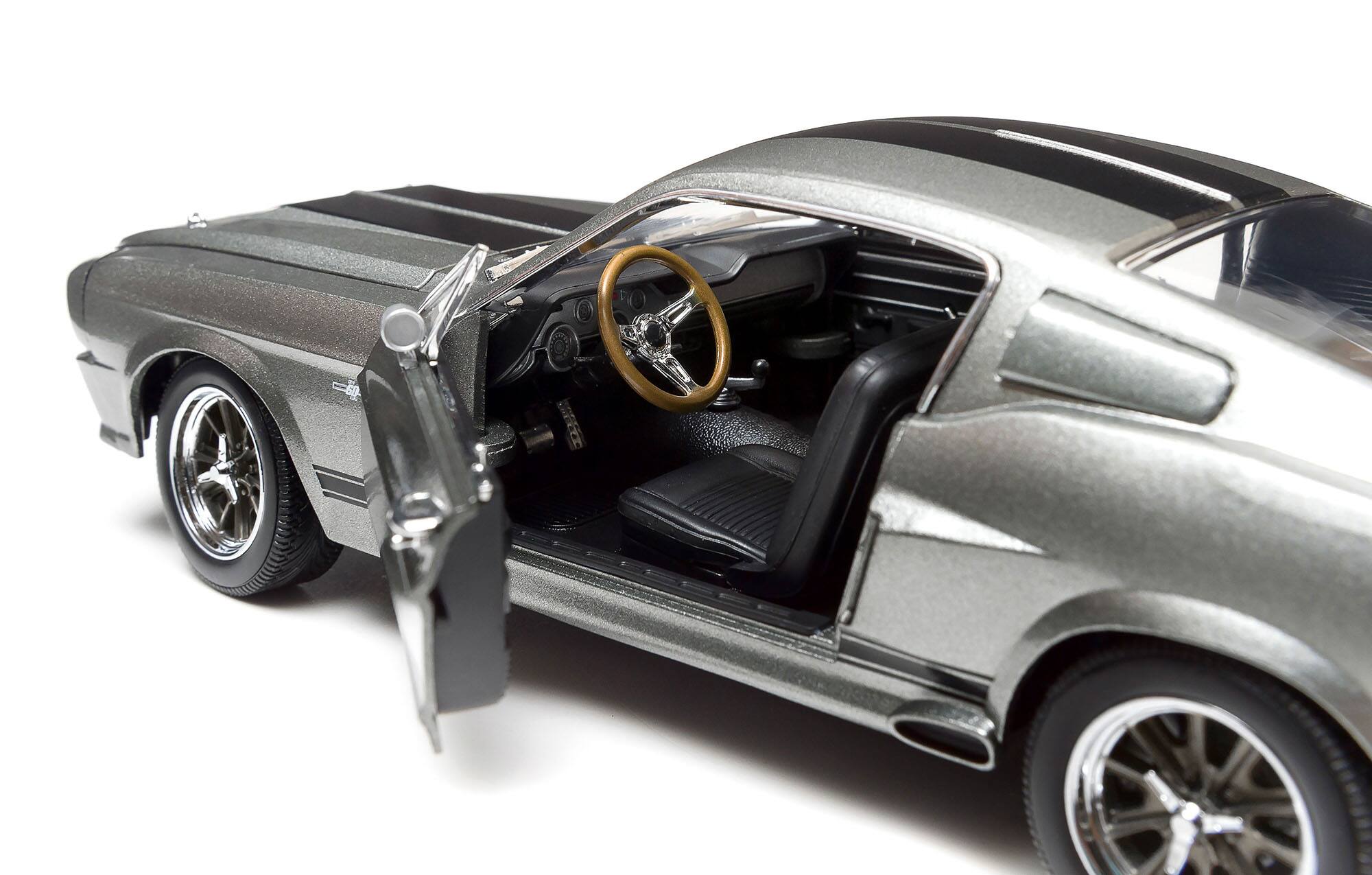 Left. Greenlight - 1967 Ford Mustang Custom "Eleanor" Gray Metallic with Black Stripes "Gone in 60 Seconds" (2000) Movie 1/18 - Gray Metallic and  Black.