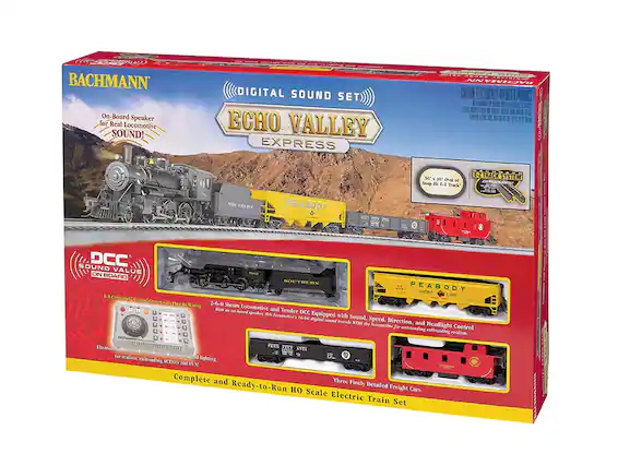 BACHMANN
On-Board Speaker for Real Locomotive SOUND!
DIGITAL SOUND SET
ECHO VALLEY EXPRESS
SOUTHERN PEABODY
2-6-0 Steam Locomotive and Tender
DCC Equipped with 16-bit digital sound, Speed, Direction, and Headlight Control for realistic railroading realism.
E-Z TRACK SYSTEM
56" x 58" oval of Snap-Hit E-Z Track
DCC SOUND VALUE ON BOARD
EZ-Command Control Center with Plug-In Wiring
Electrochemical control for realistic sound, speed, direction, and lighting for realistic railroading ACTION and FUN!
Three Finely Detailed Freight Cars
and Ready-to-Run HO Scale Electric Train Set
Complete and Ready-to-Run HO Scale Electric Train Set