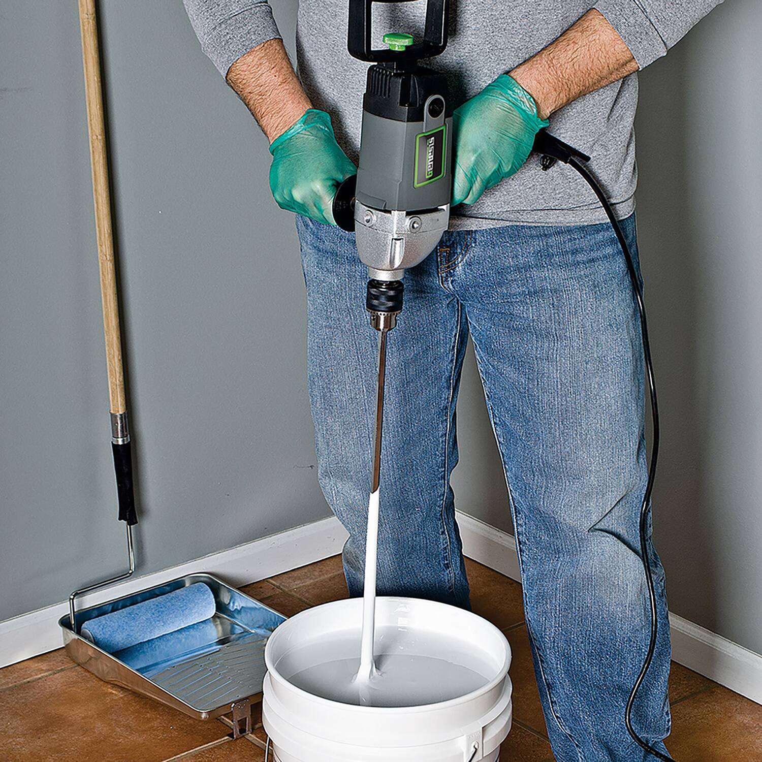 Left. Genesis - 9 Amp Corded Variable-Speed Spade-Handle Drill, 1/2" Metal Chuck, 2-Position Spade Handle, 3-Position Aux Handle.