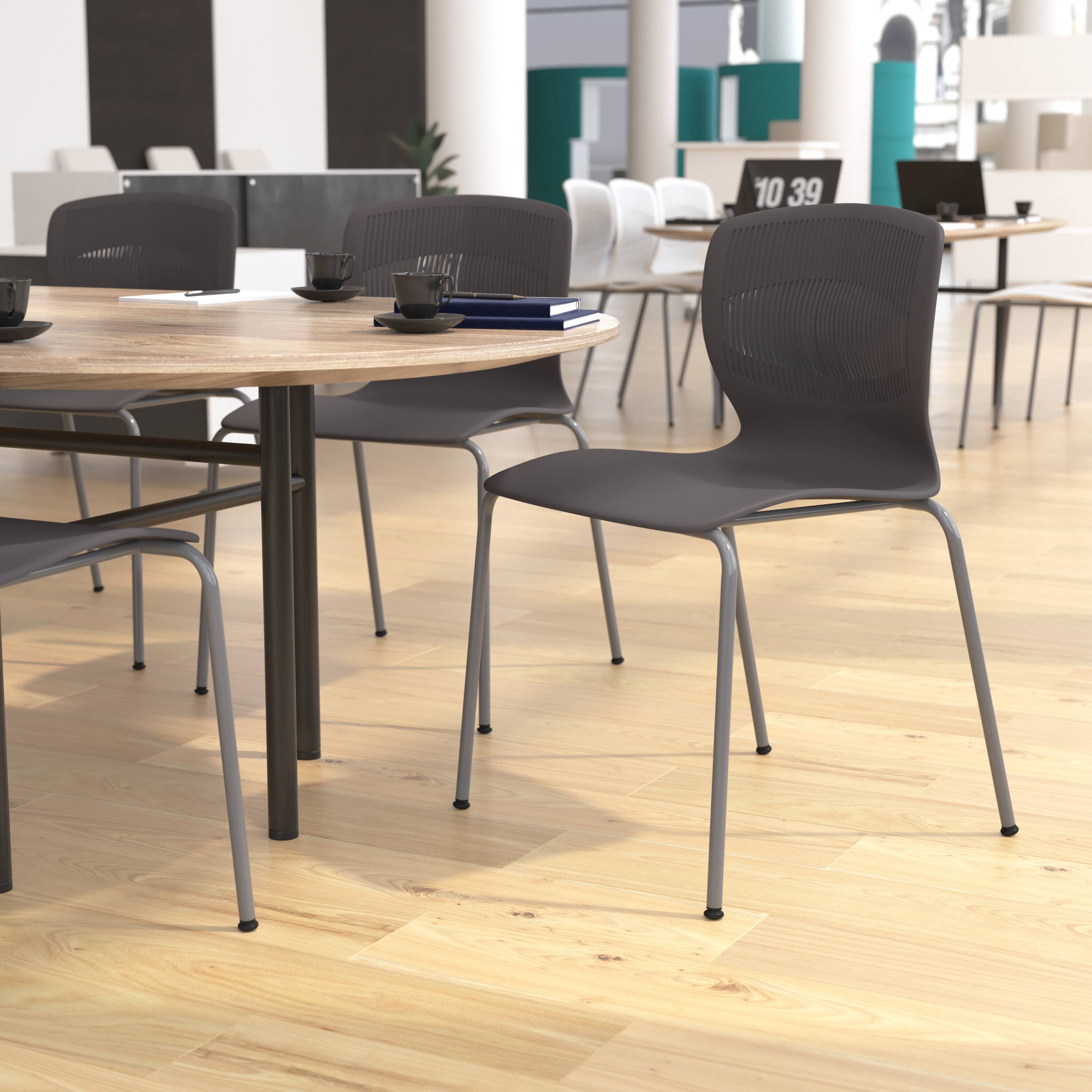 Alt View 2. Emma + Oliver - Heavy Duty 770 lb. Capacity Plastic Stack Chair with Steel Sled Base - Gray.