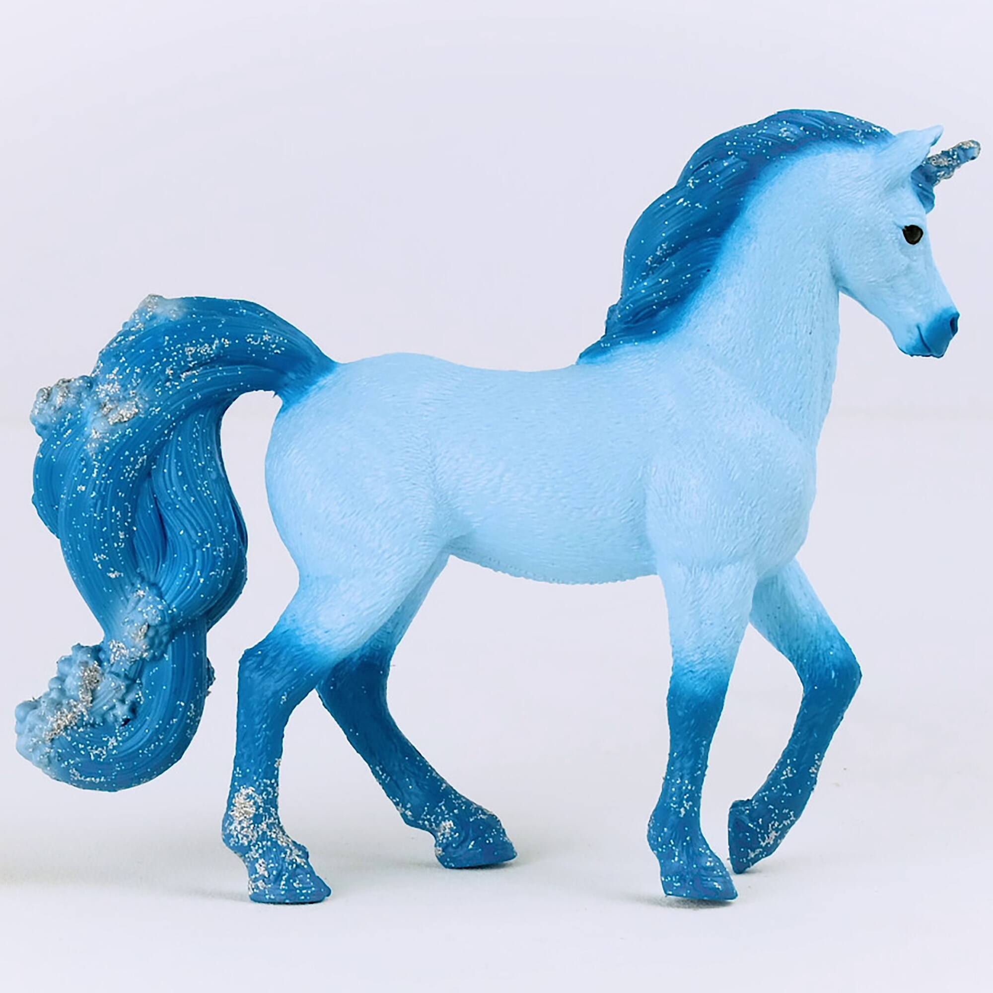 Left. Schleich - Bayala: Elementa Water Unicorn Mare.
