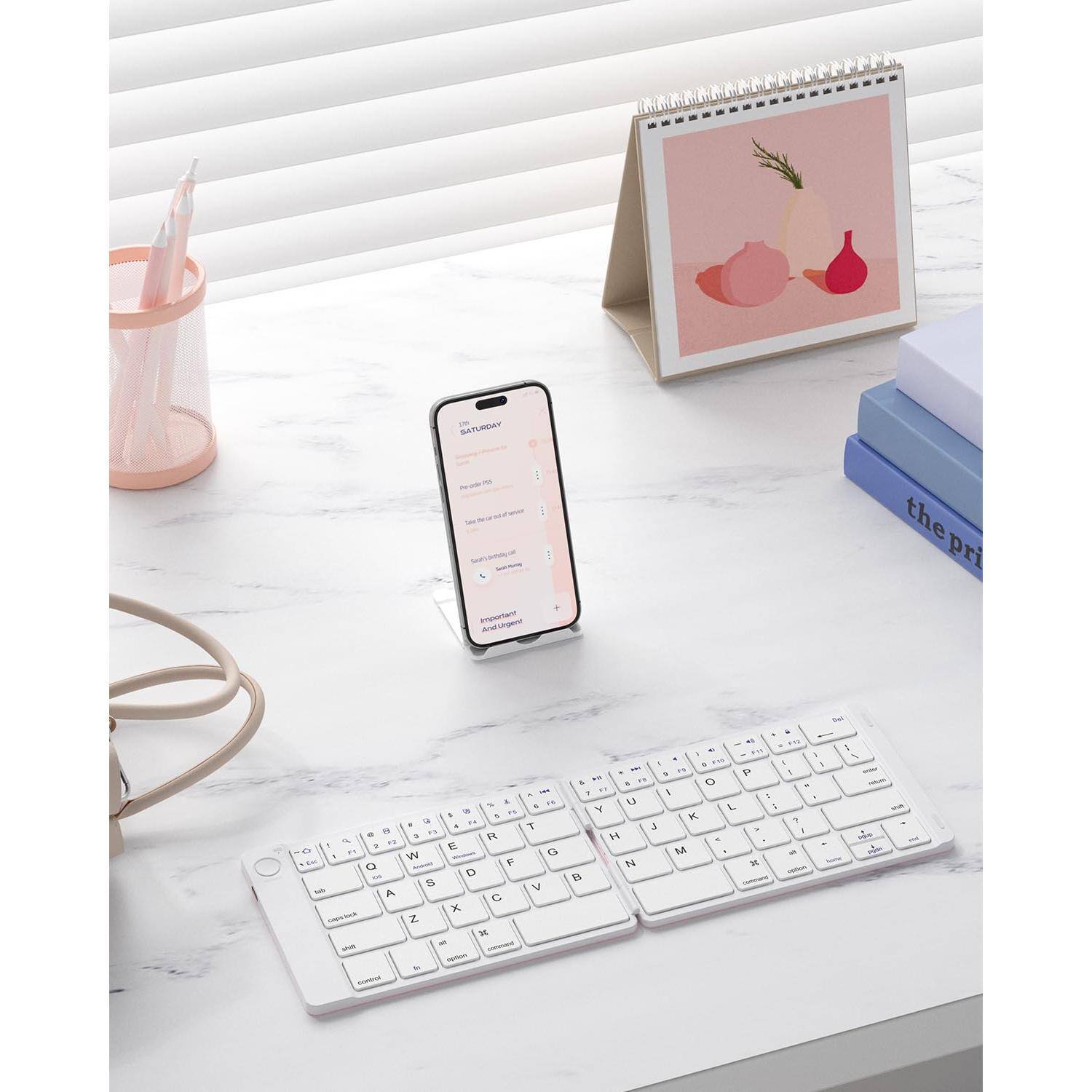 Sure, here is the corrected text from the image:

---

**Top Left (on the phone screen):**
- SATURDAY
- 10:00 AM
- Take out the trash
- 12:00 PM
- Improve your posture and relax!

**Top Right (on the calendar):**
- the
- 14

**Bottom Left (on the keyboard):**
- (No text)

**Bottom Right (on the book):**
- the
- 14

---