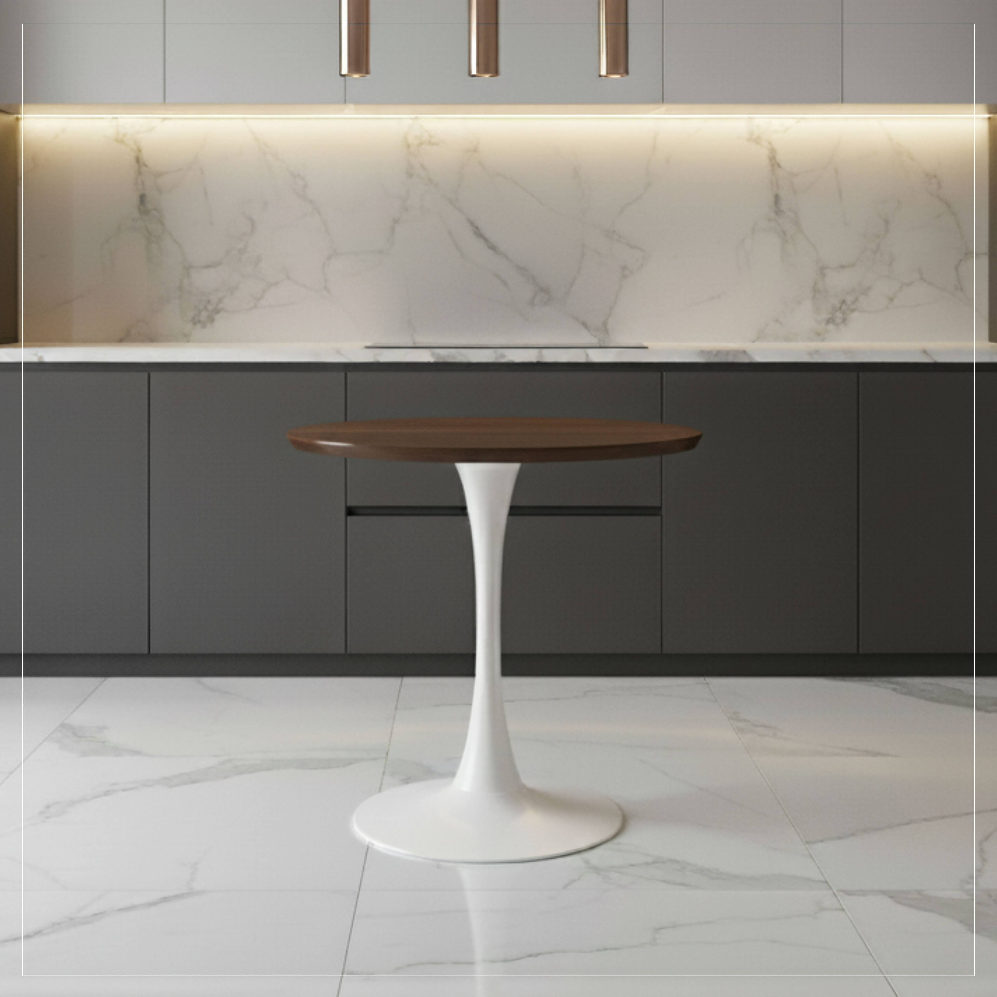 Angle. LeisureMod - Bristol 27" Modern Round Dining Table with MDF Wood Top - Sleek Steel Pedestal Base - MDF - Light Natural.